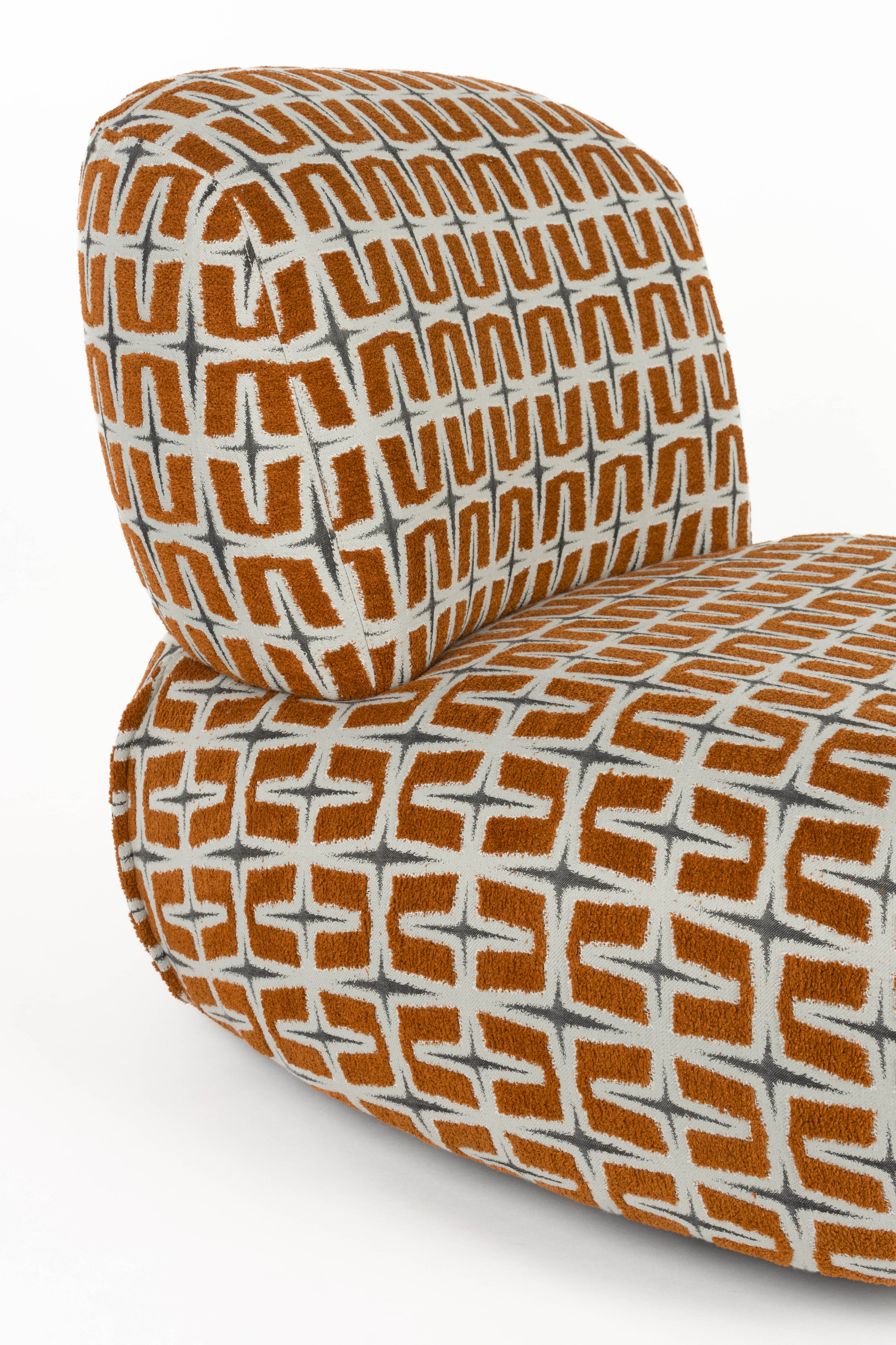 Sessel RITZ orange mit geometrischem Muster