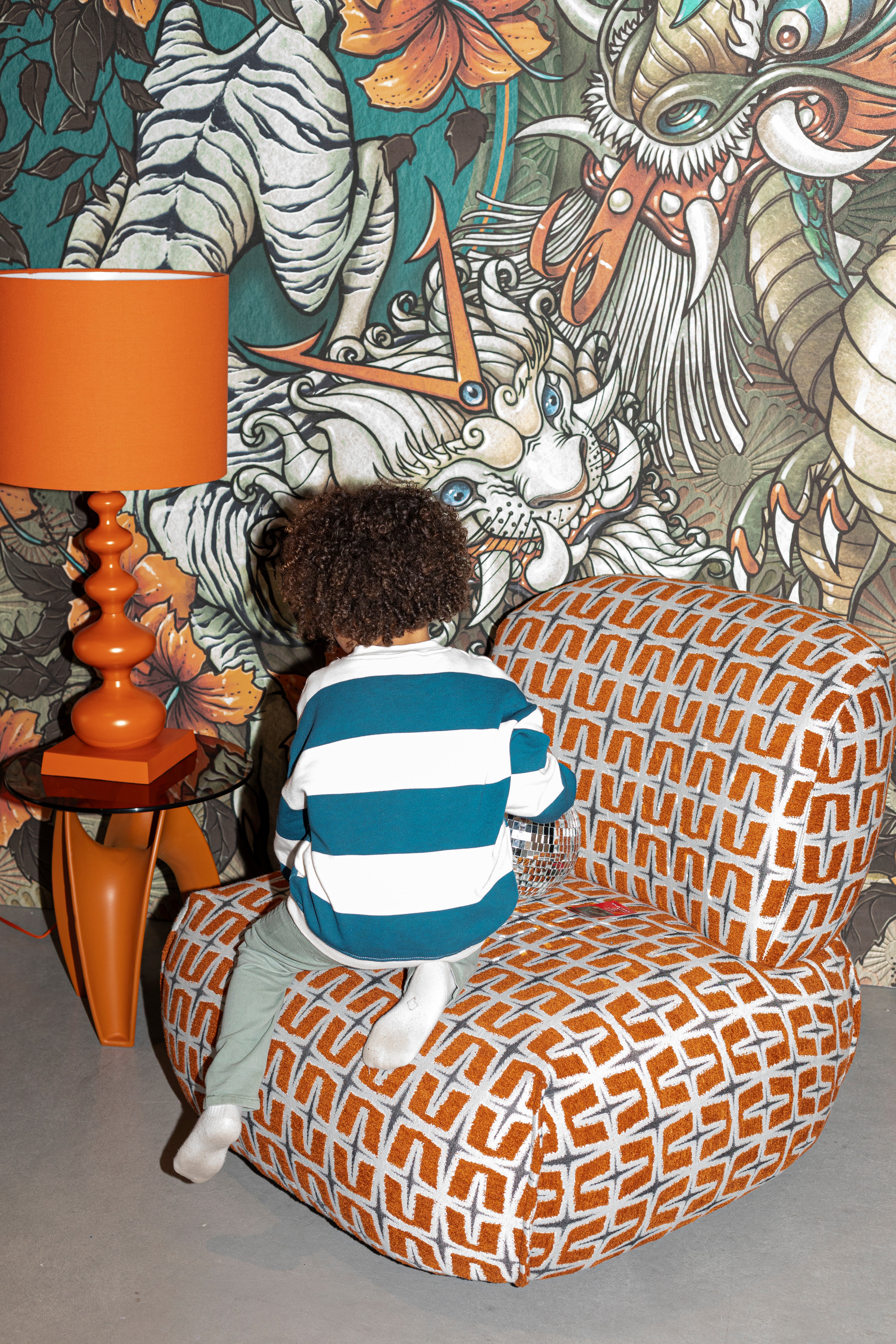 Sessel RITZ orange mit geometrischem Muster
