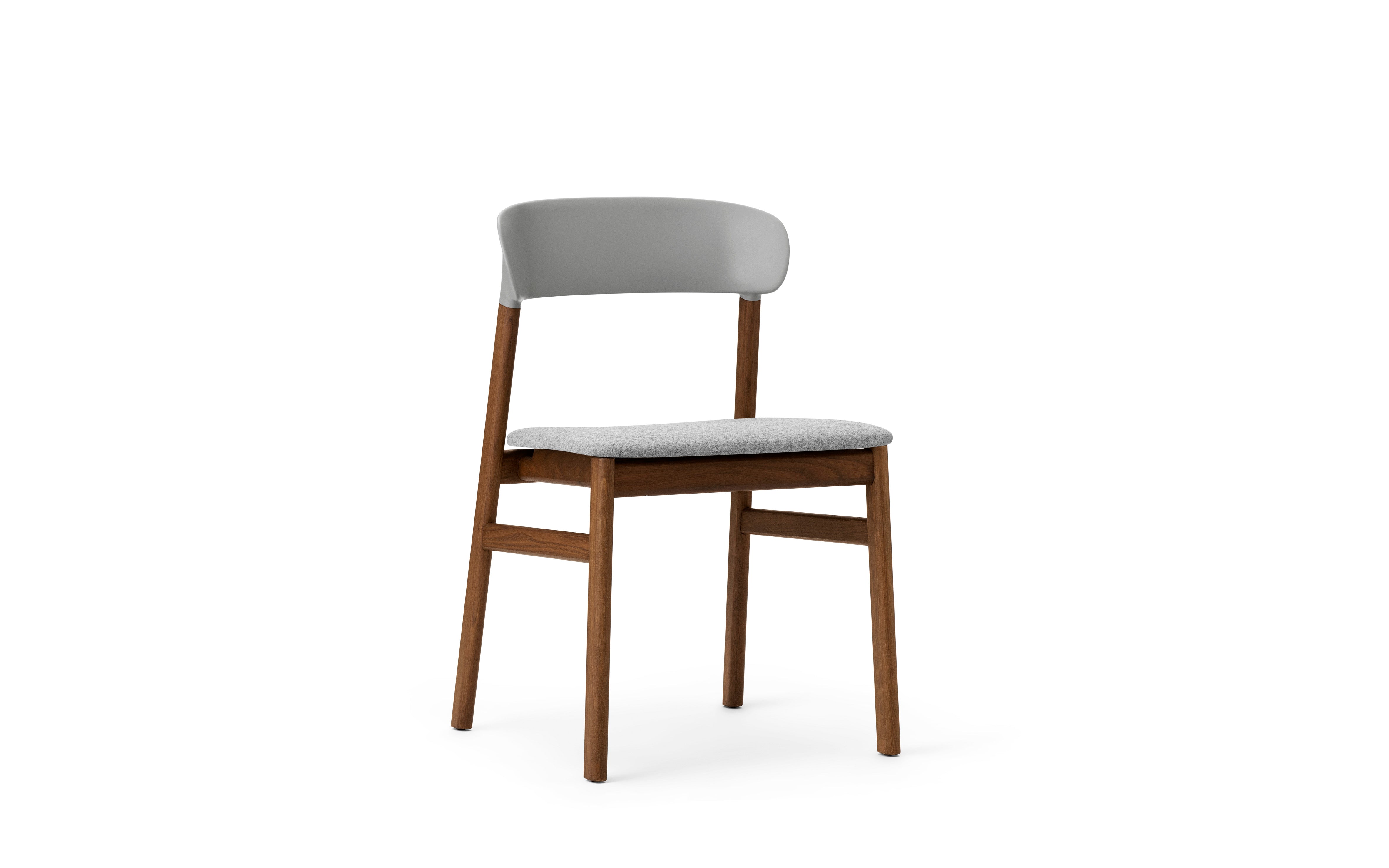 Herit upholstered chair with a dark oak base