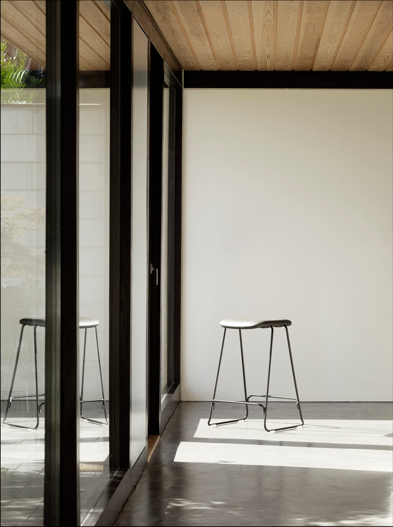 Bar chair upholstered just with a black base