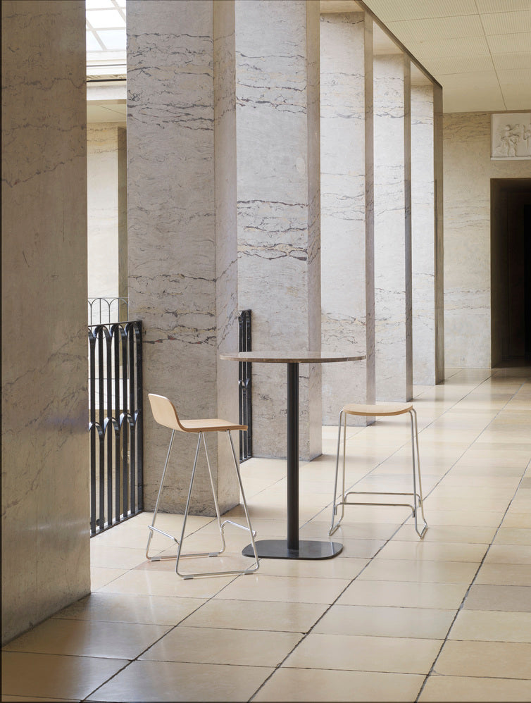 Bar chair upholstered just with a black base