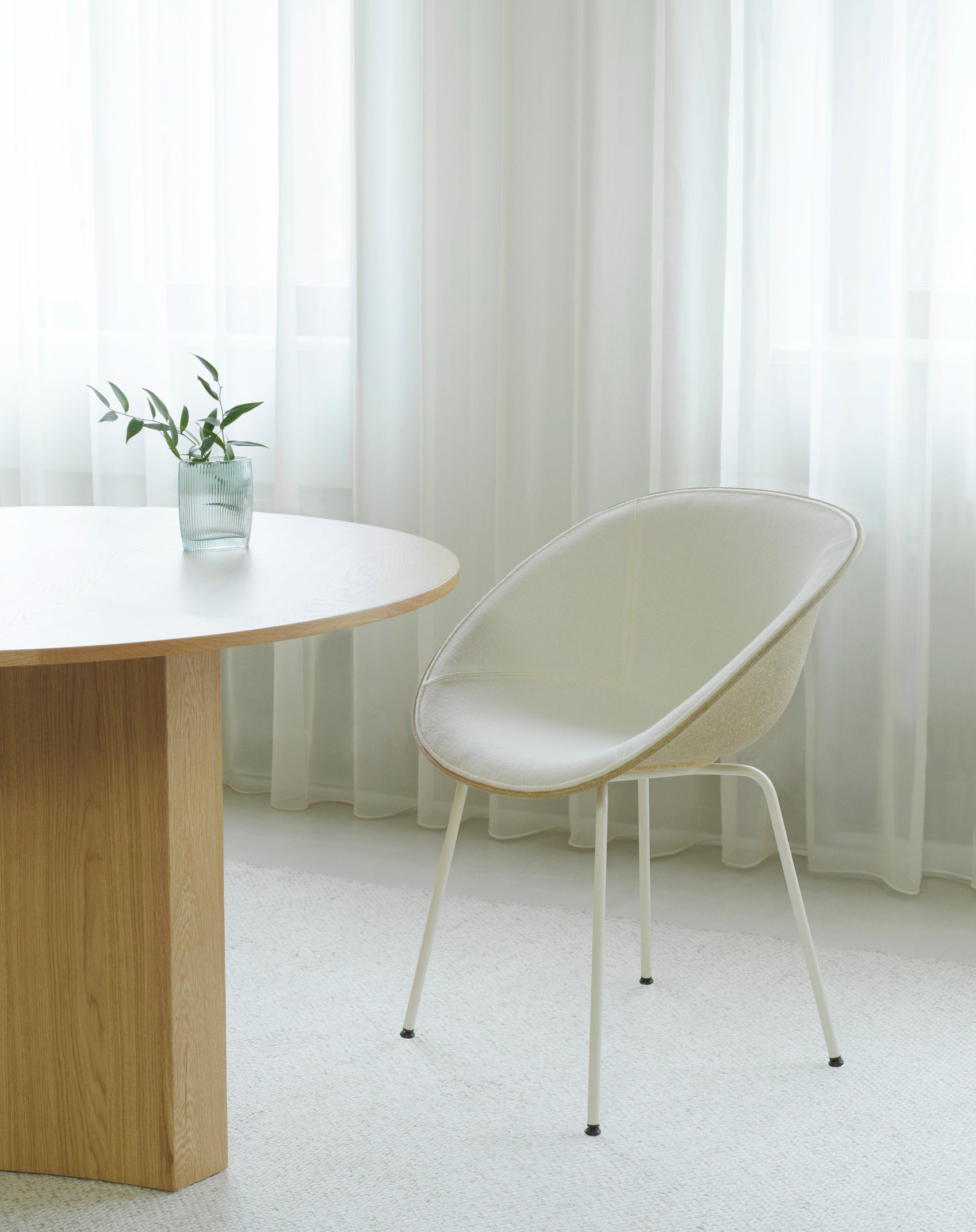 A chair upholstered mats with a cream base