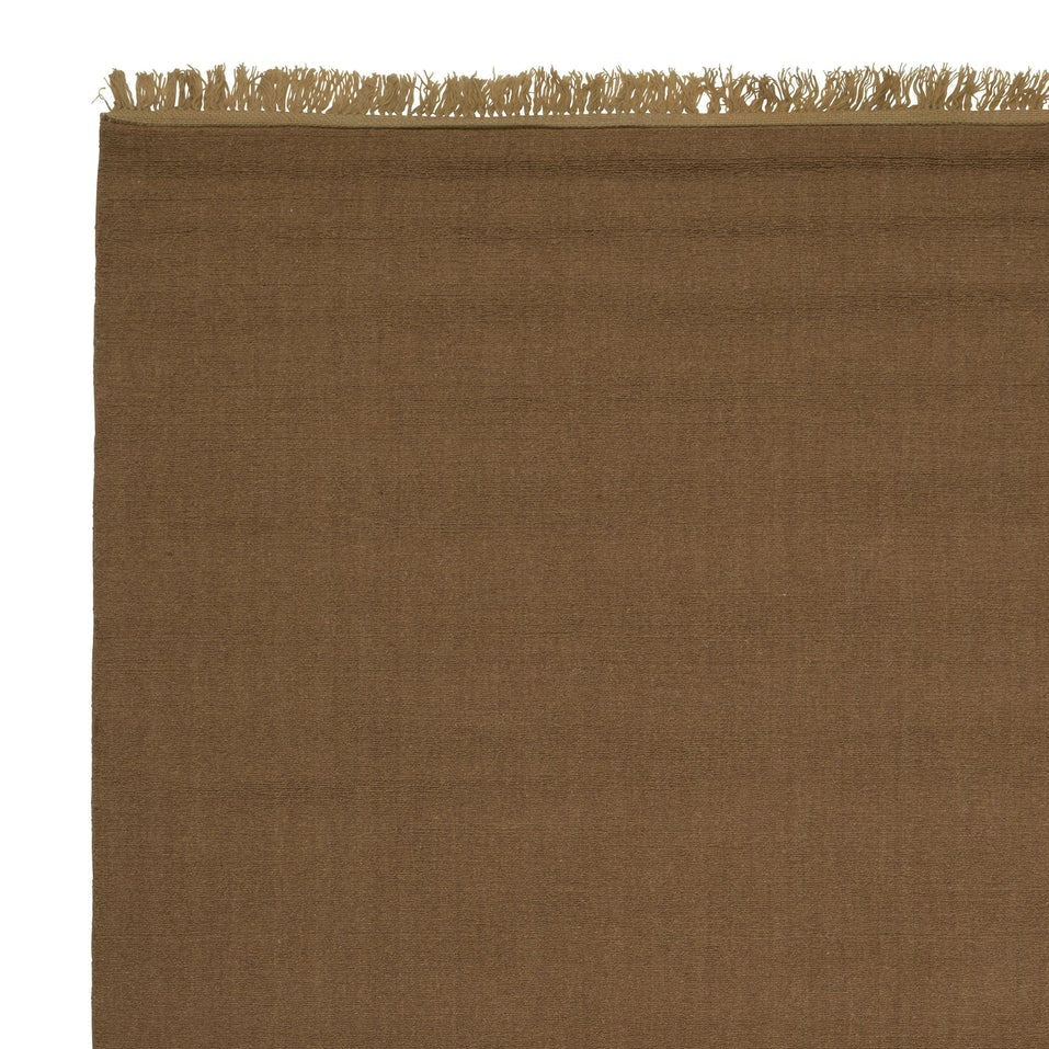 UNE ochre rug