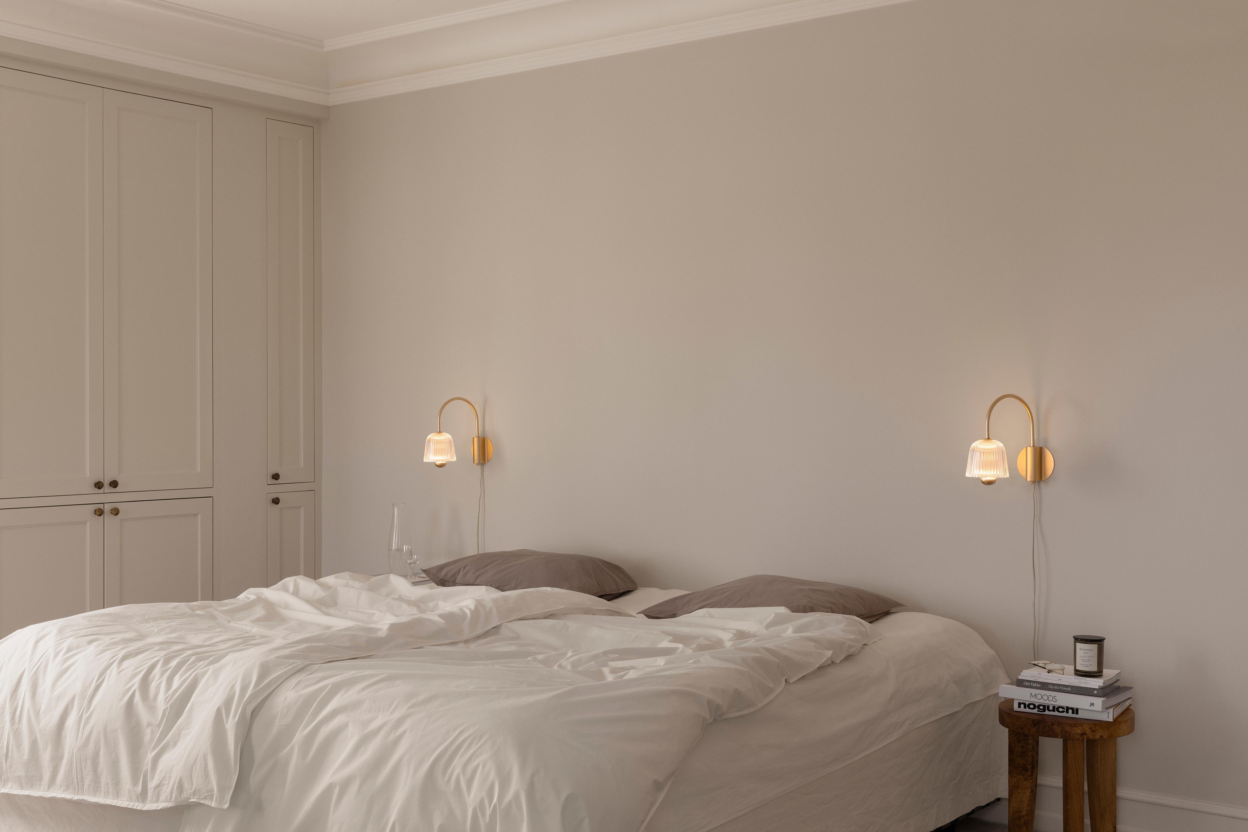 Wandleuchte ASTEEA gold mit transparentem Design