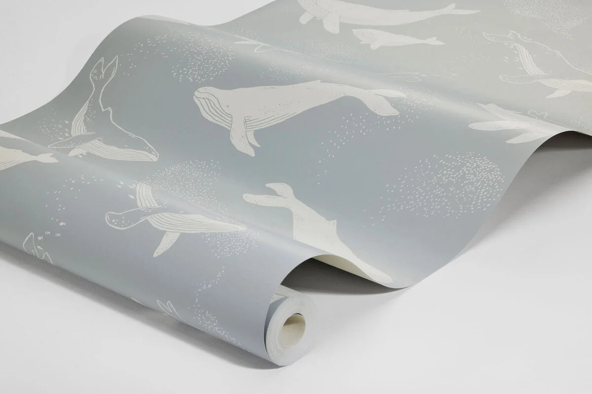 Children's wallpaper with a whale animal motif in blue and white