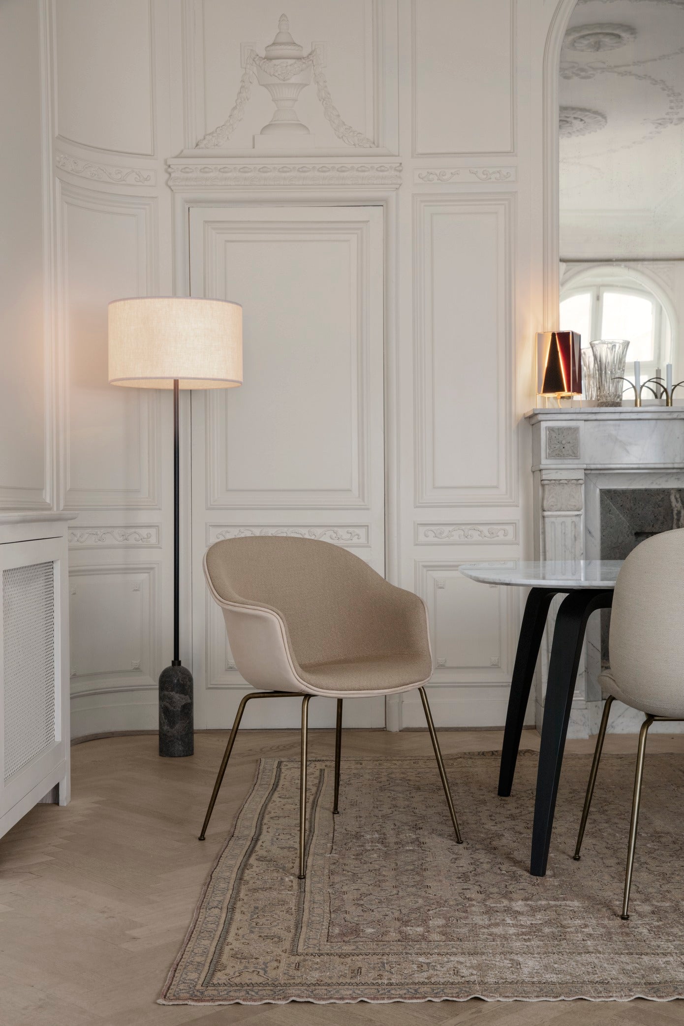 BAT upholstered chair with black chrome base