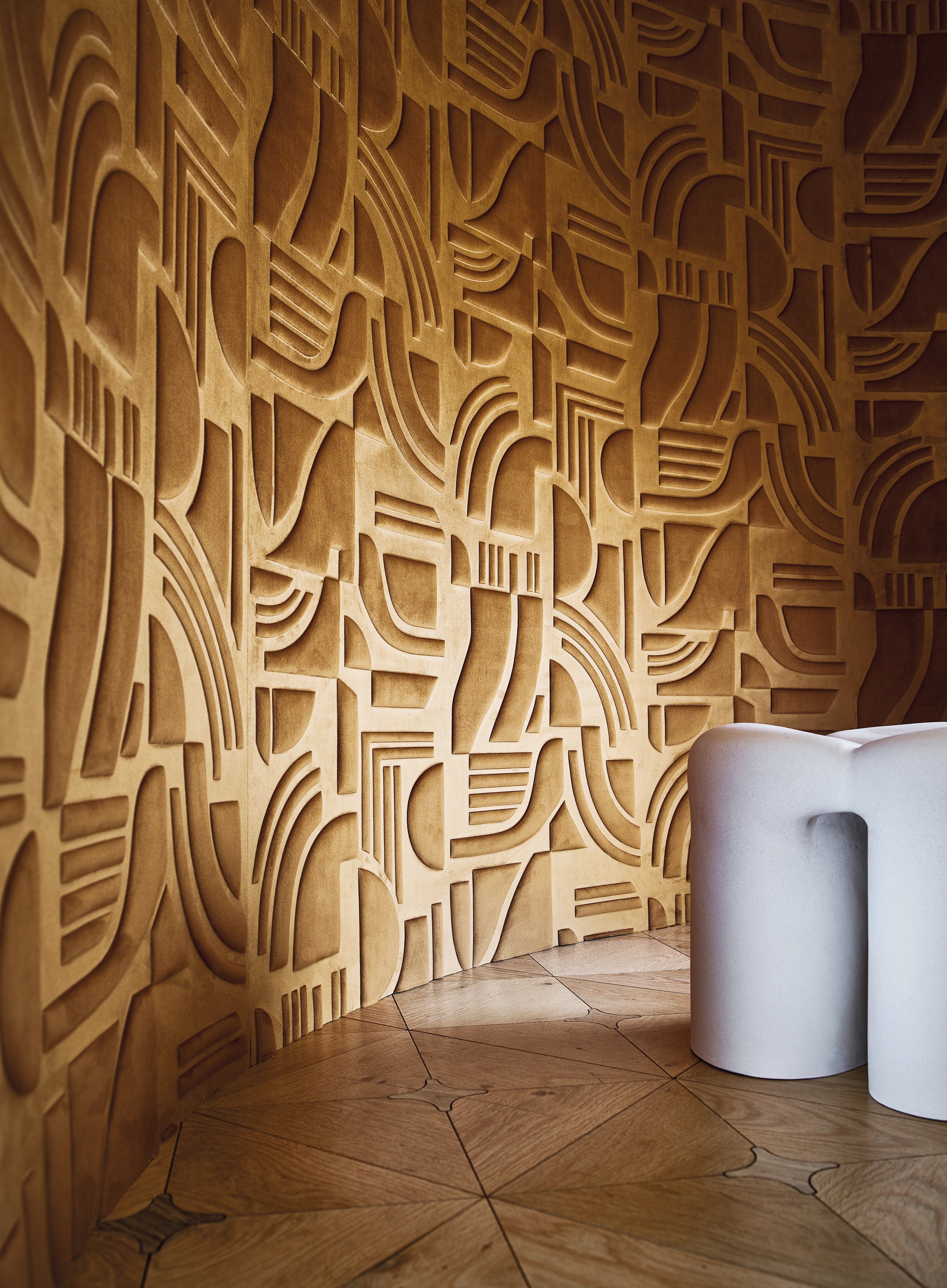Textured textile wallpaper with a geometric pattern ARCANE - AMBRE amber