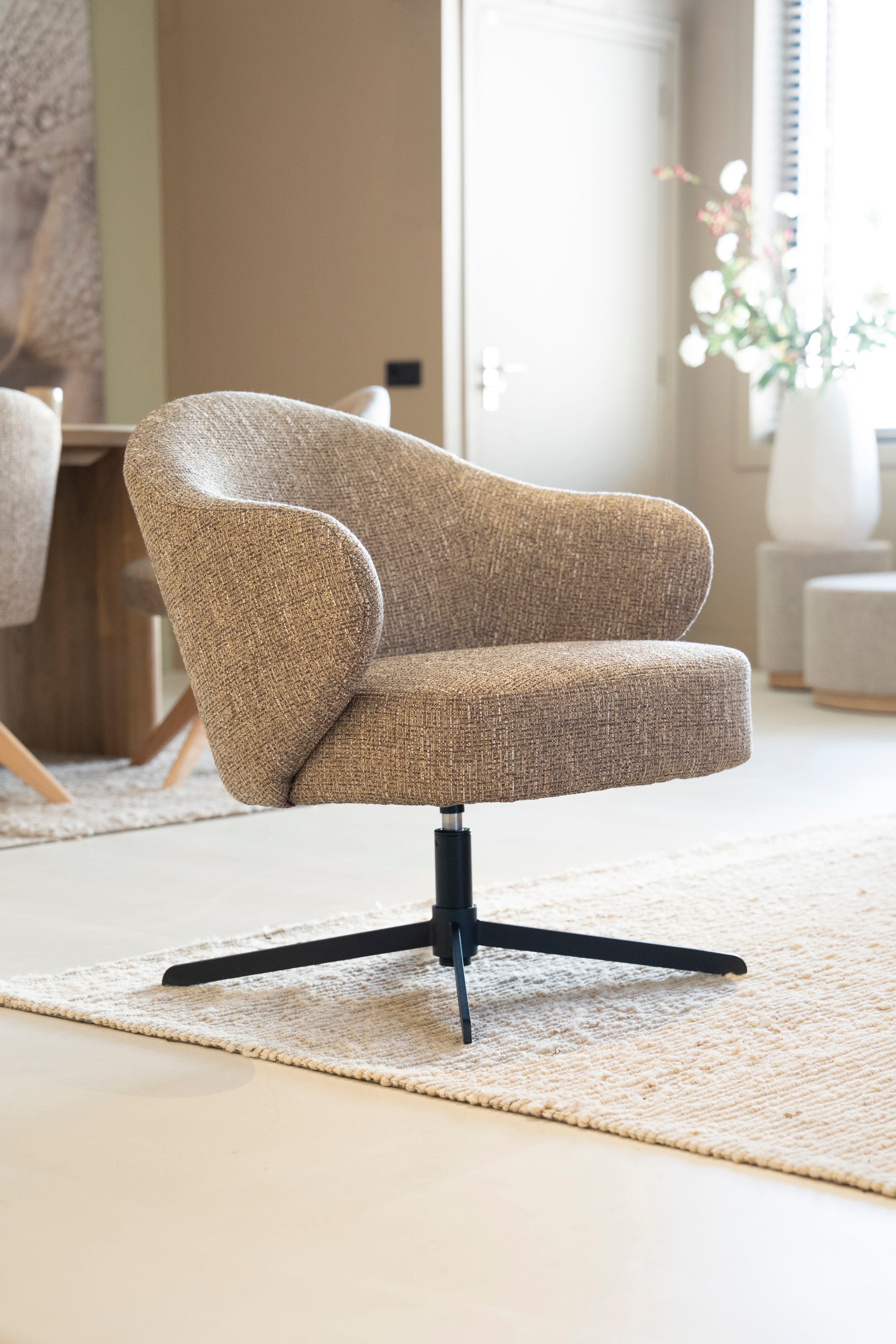CONNOR beige swivel armchair with black base