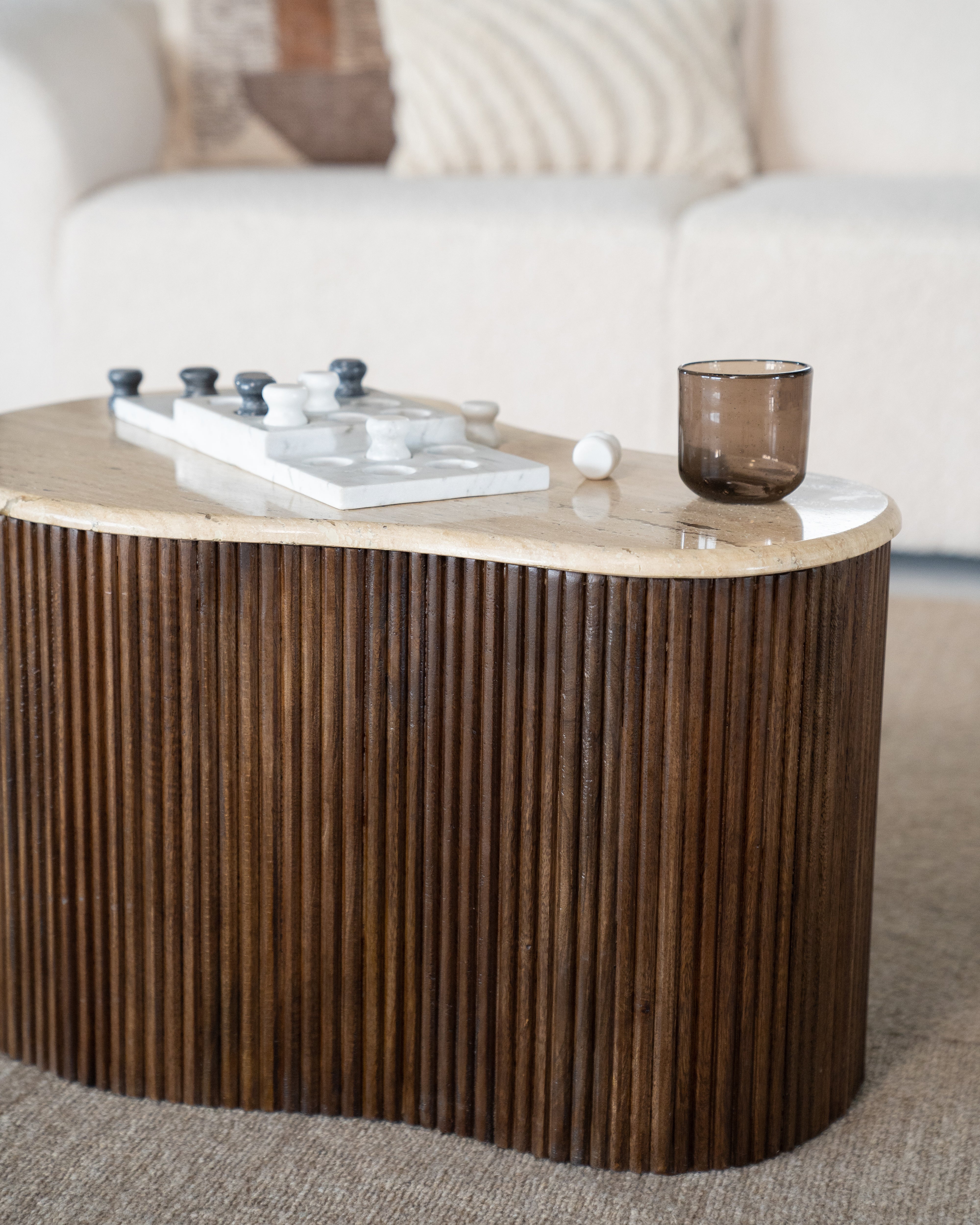 MARI coffee table made of mango wood with a travertine top
