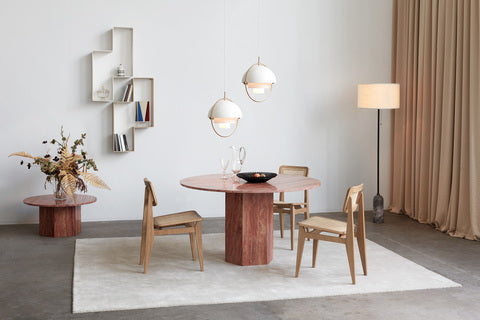 EPIC round table red travertine
