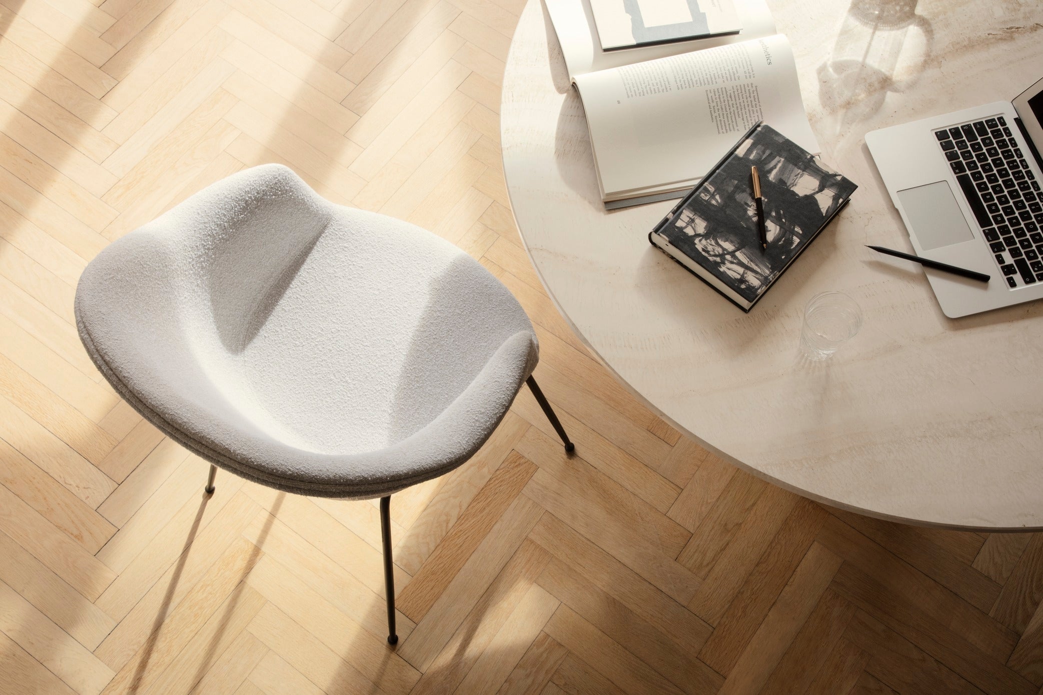 BAT upholstered chair with black chrome base