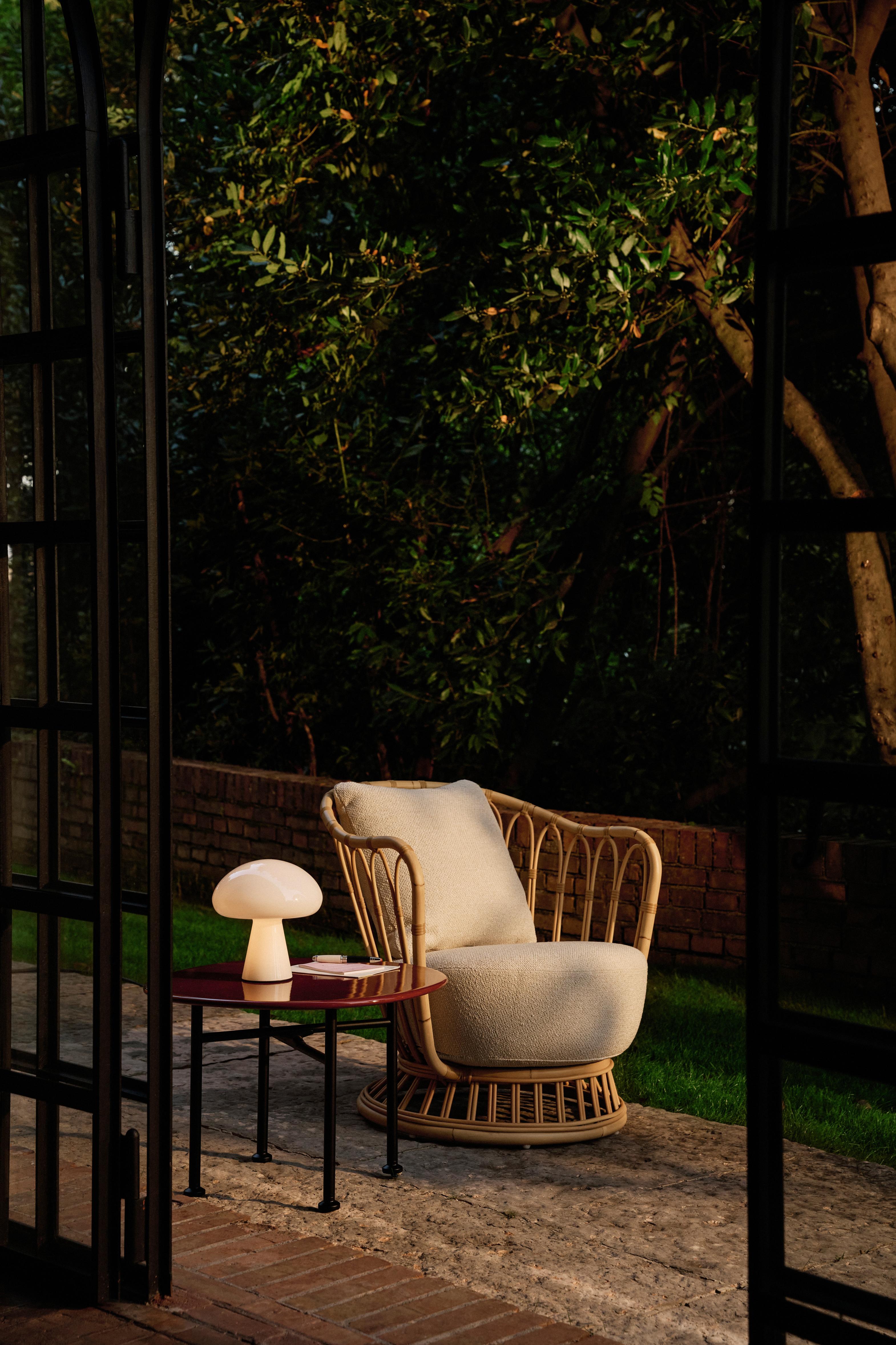 GRACE upholstered garden armchair with a rattan base