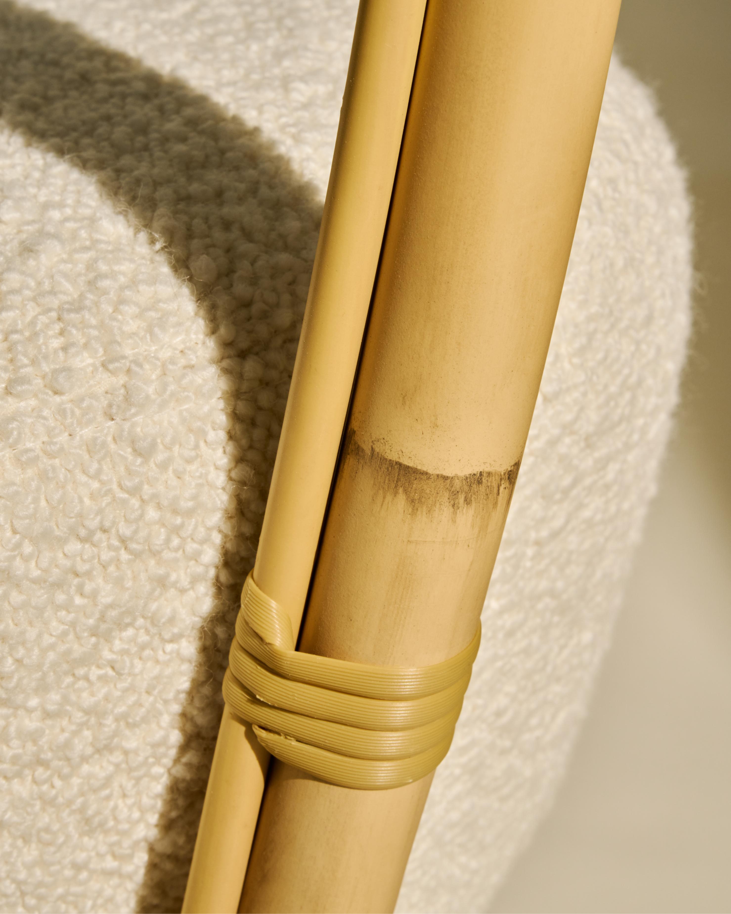 GRACE upholstered garden armchair with a rattan base