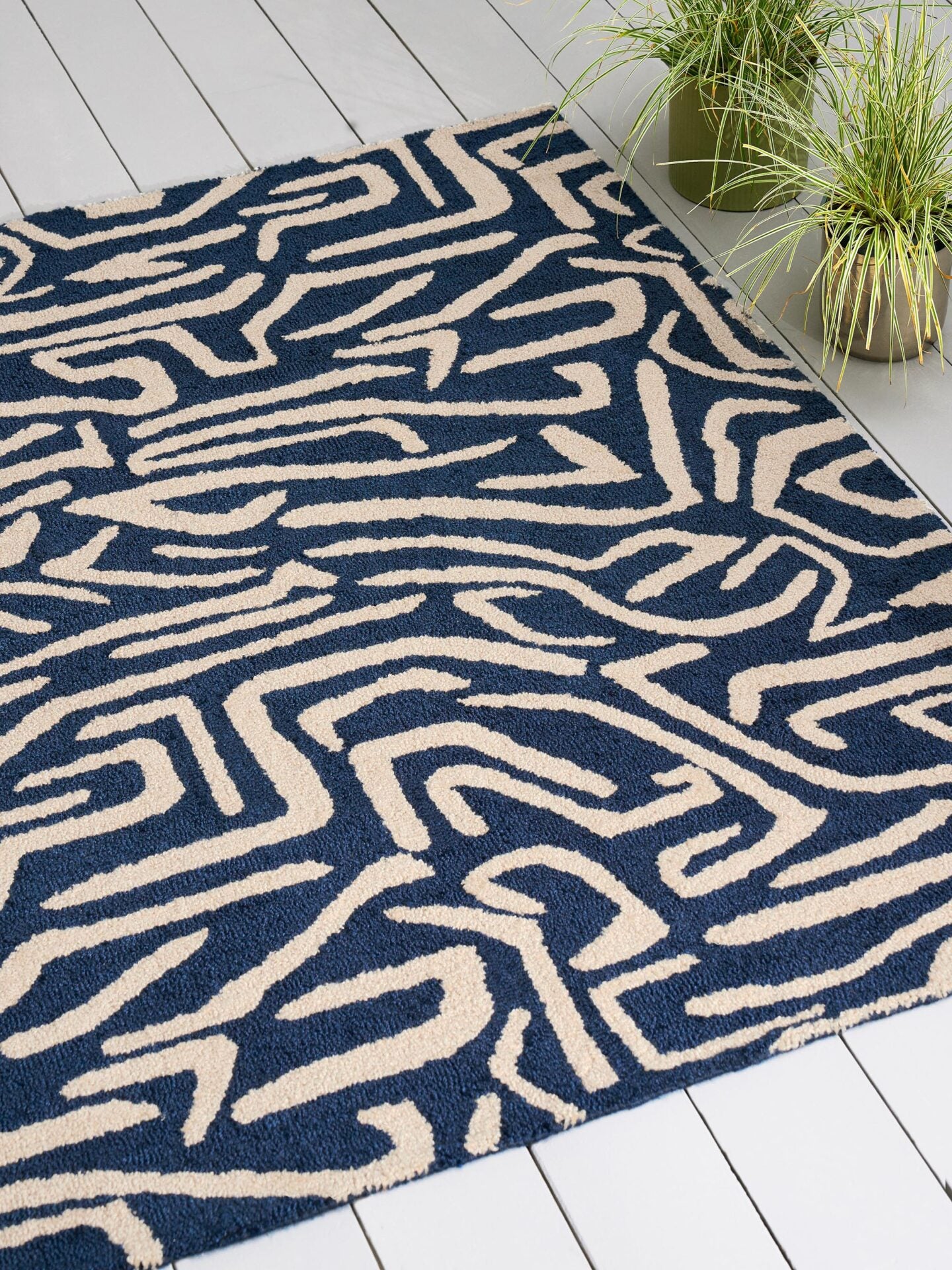 Melodic beige and navy blue rug