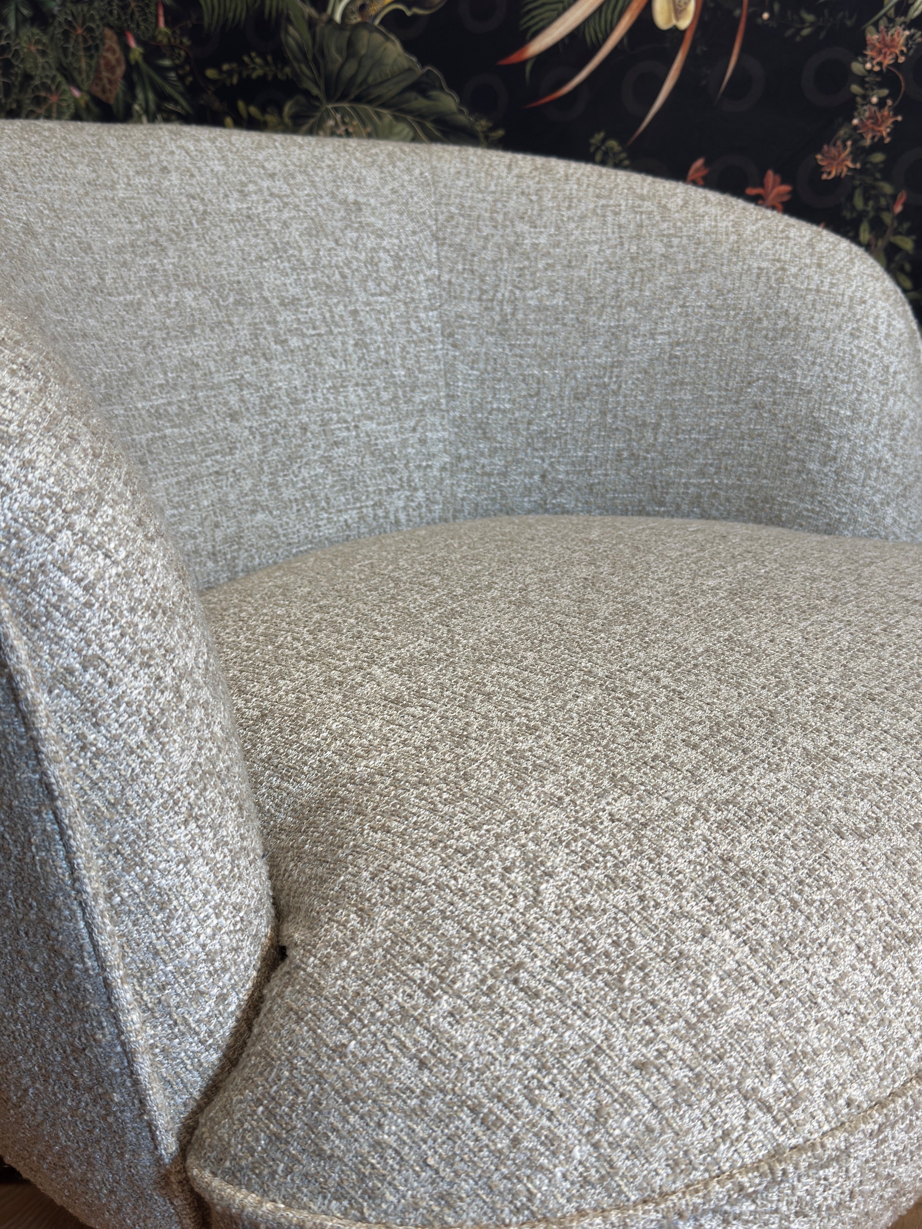 Upholstered armchair BENTON in gray-beige with a wooden base - display model