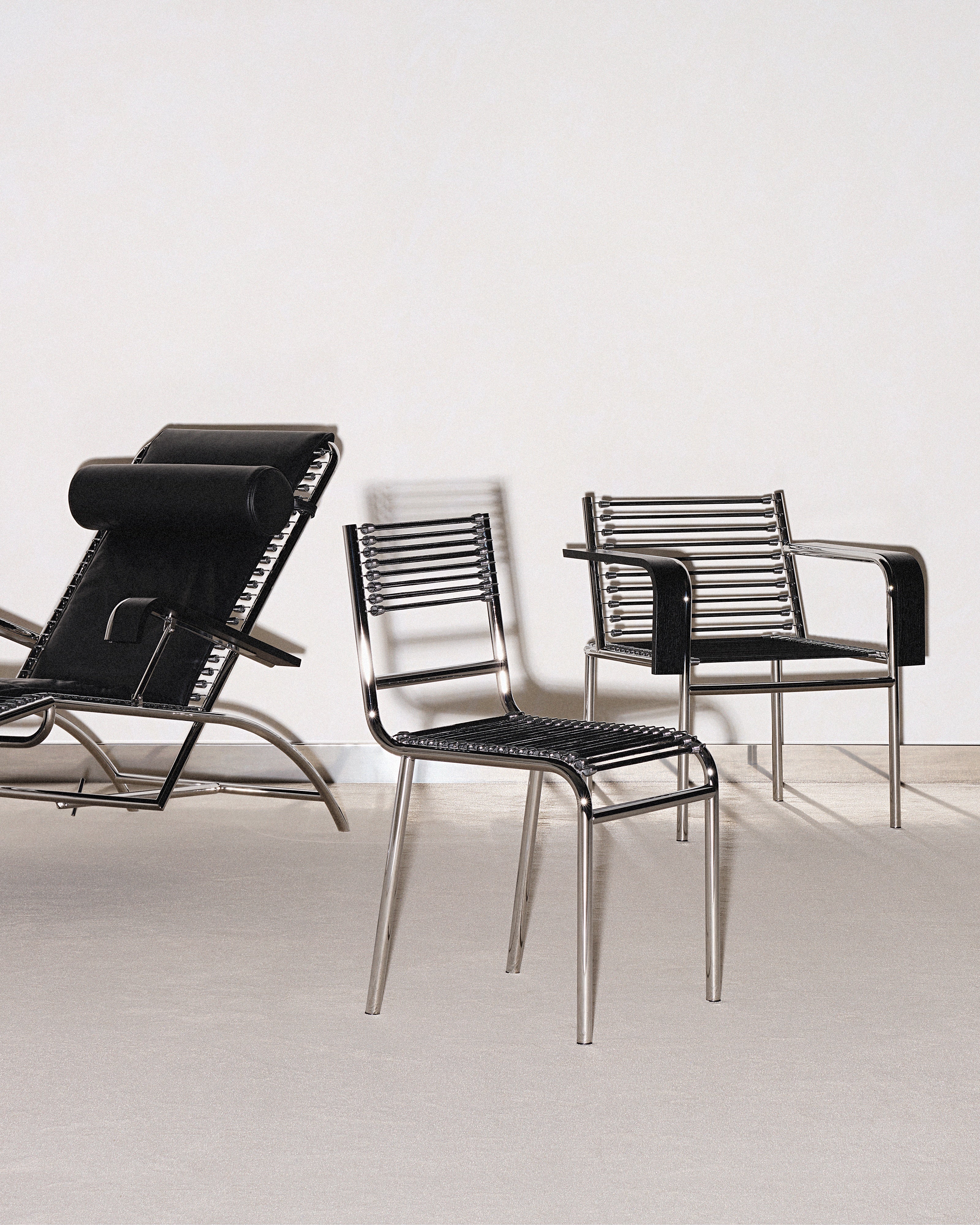 SANDOWS Sessel in Schwarz mit Stahlbasis