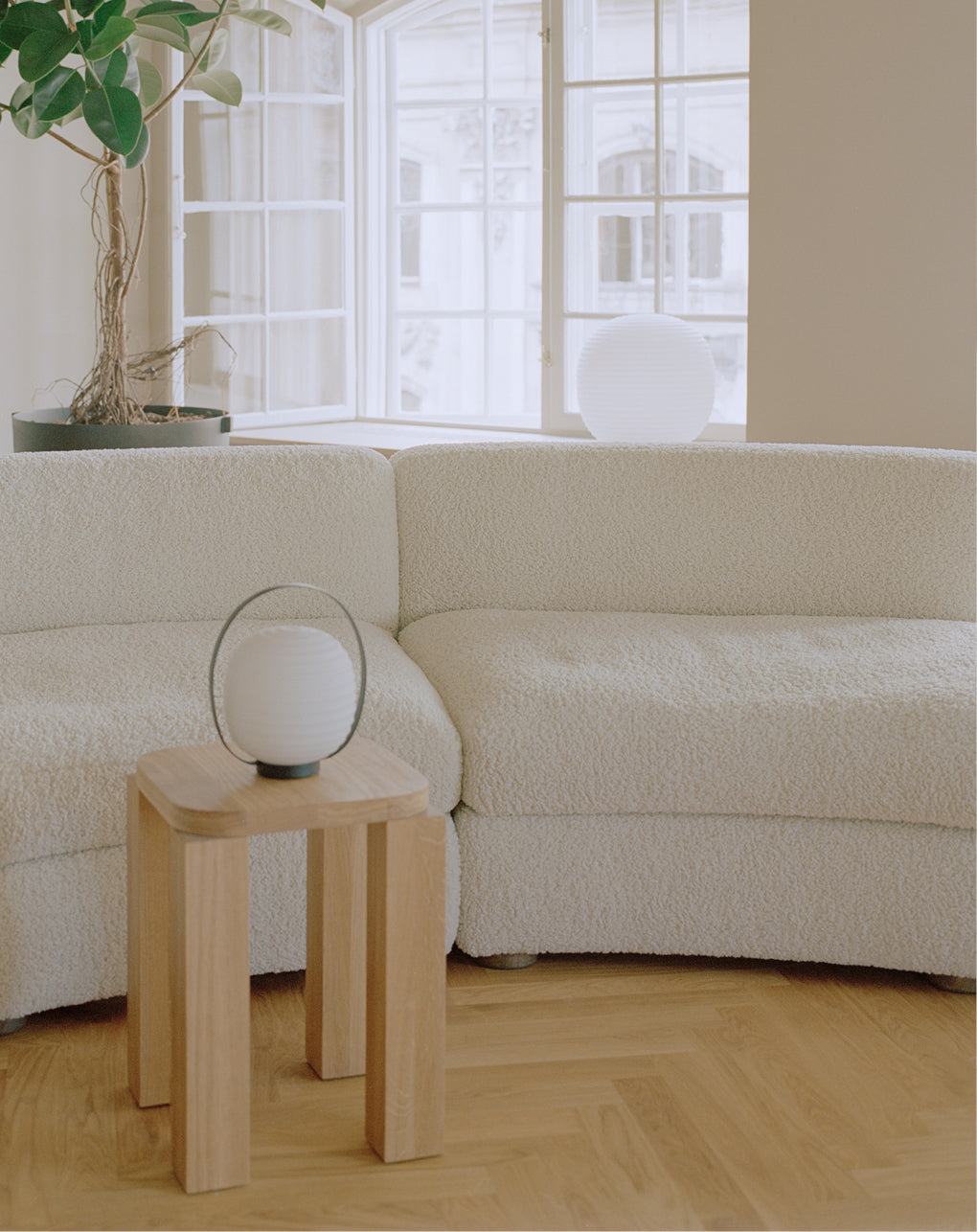 Lantern white portable lamp with a black handle