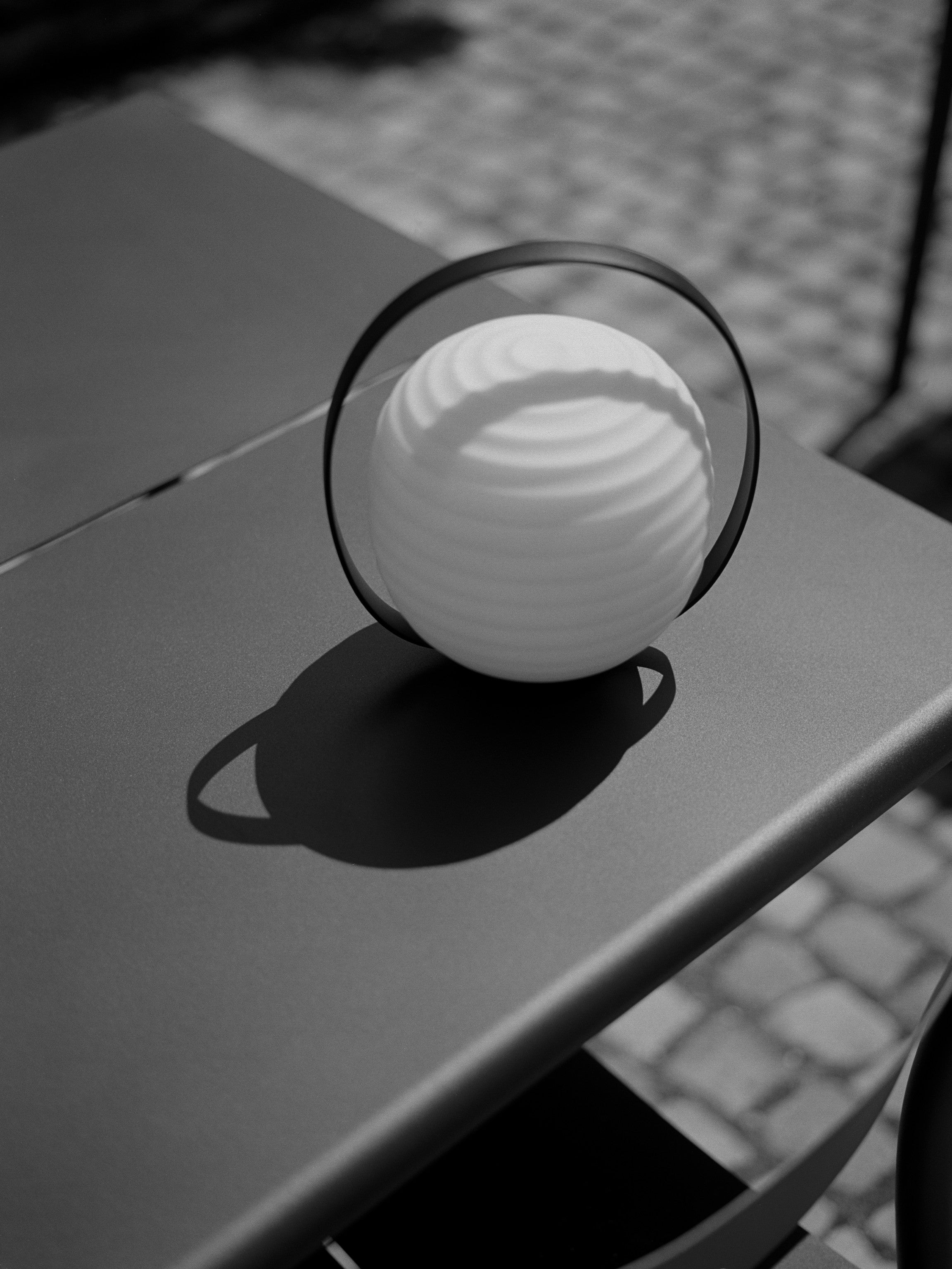 Lantern white portable lamp with a black handle