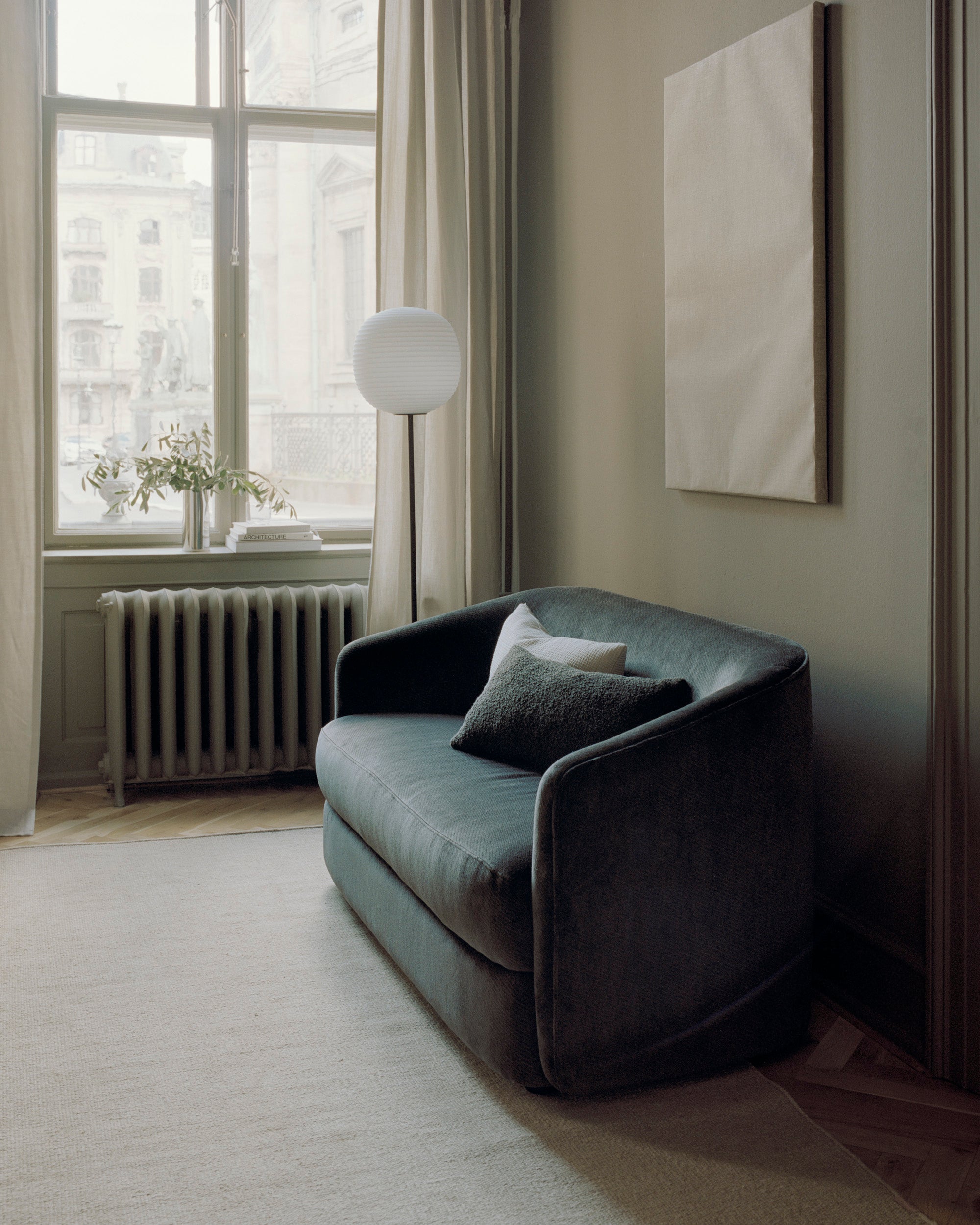 Lantern white floor lamp with a black base