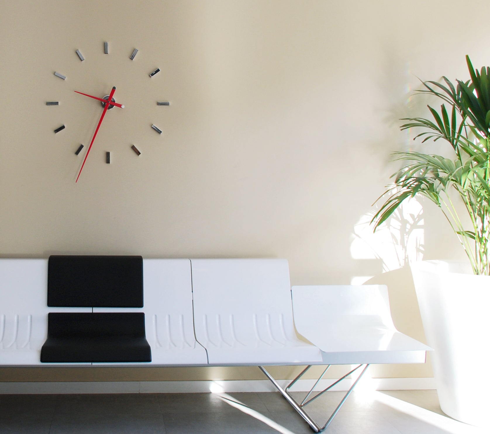 Chromed wall clock TACON with red finish