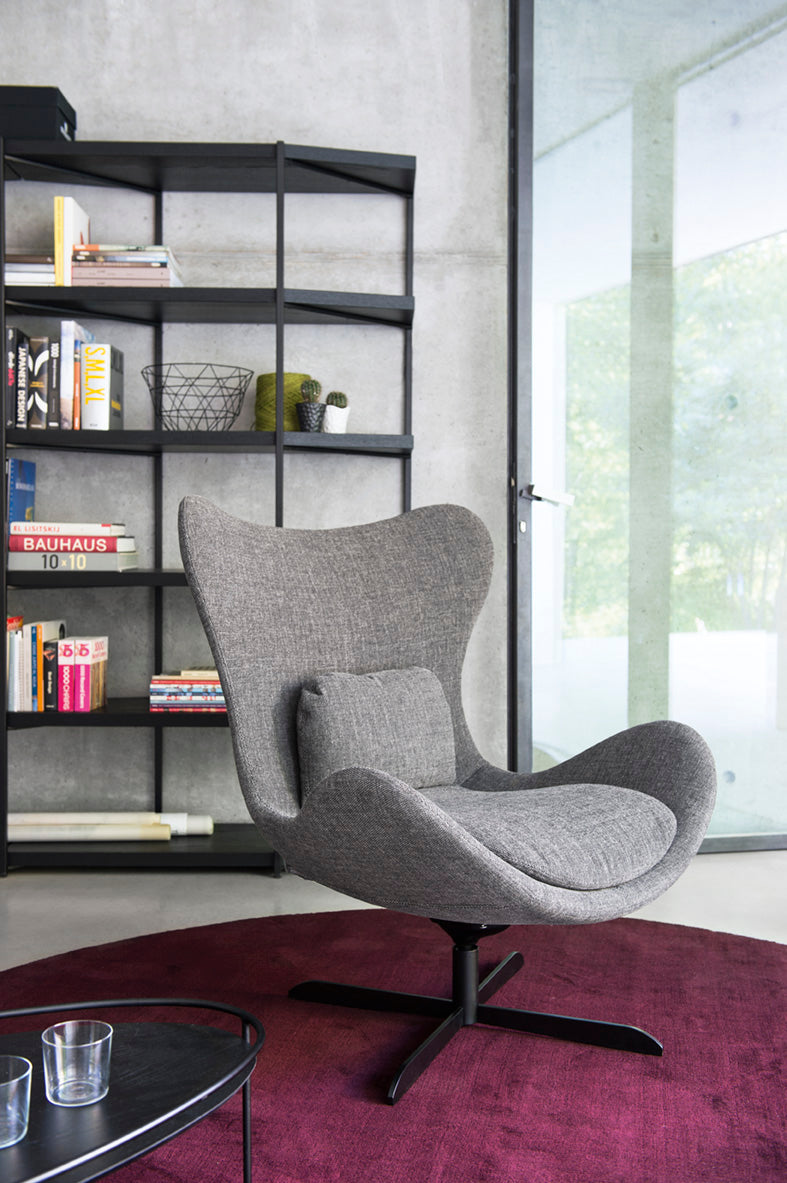 LAZY upholstered swivel armchair with a black metal base