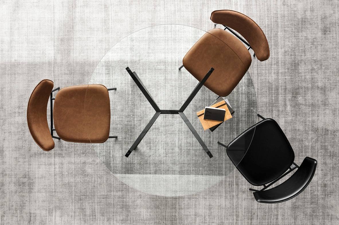 FIFTIES upholstered chair with a black base