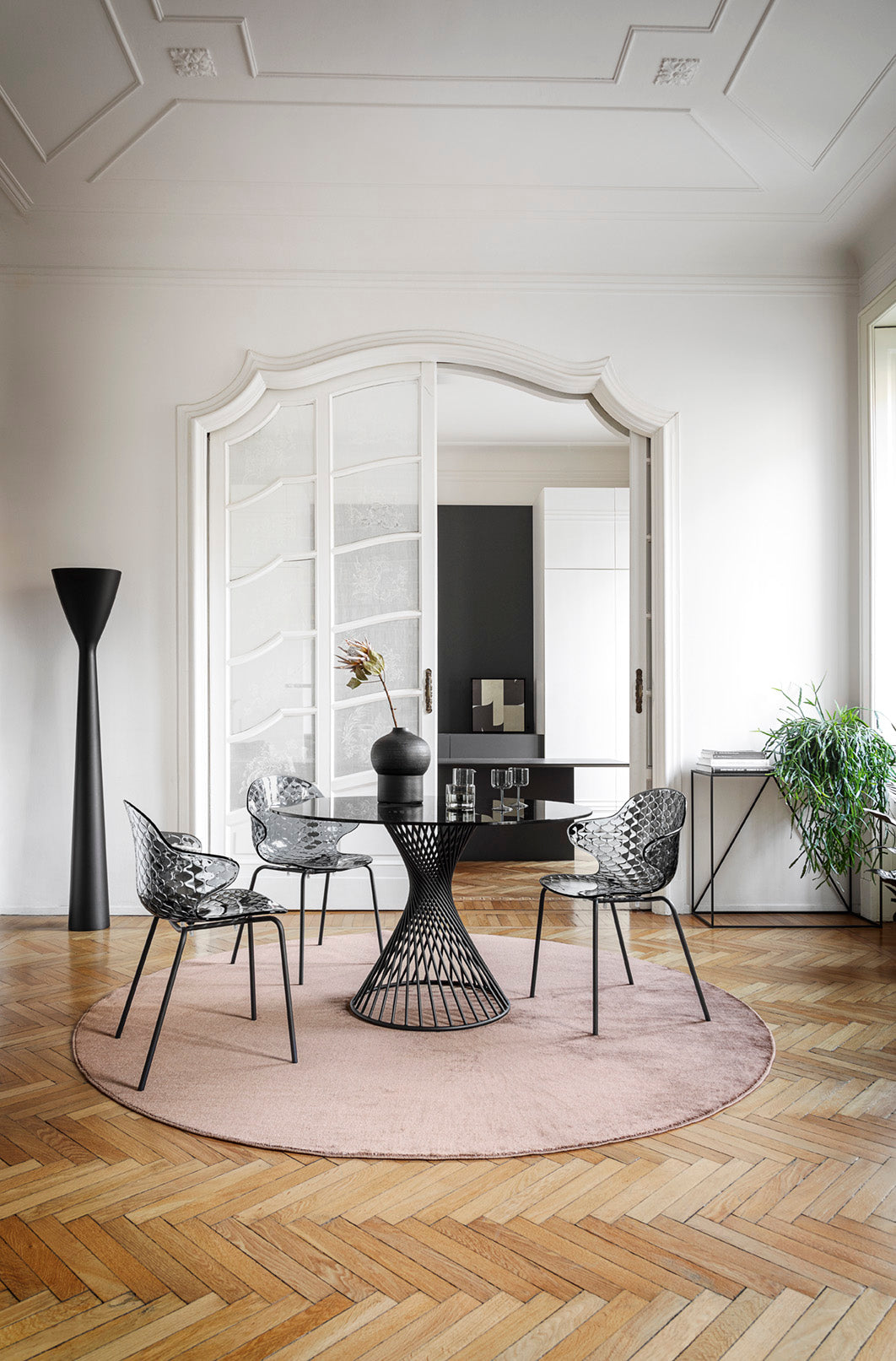 SAINT TROPEZ chair with a transparent seat and a golden metal base