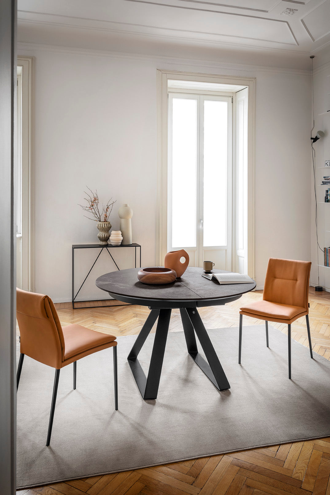 CARMEN LARGE upholstered chair with a black base