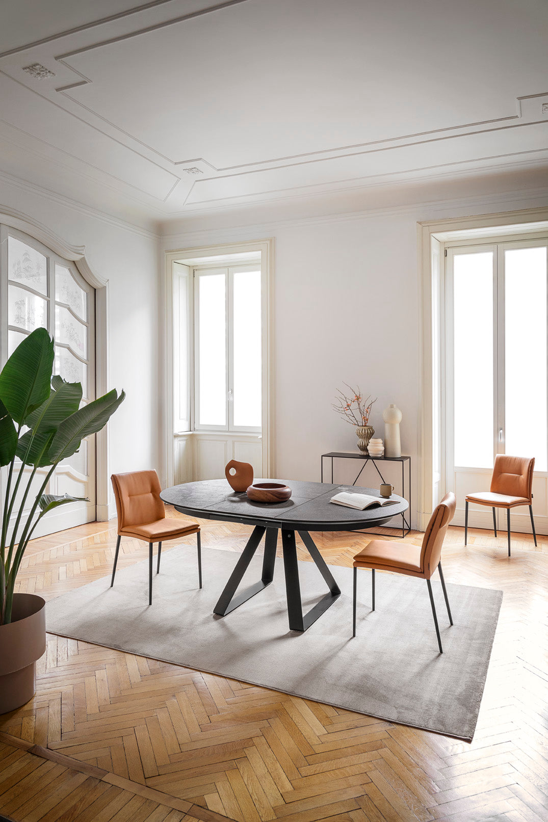 CARMEN LARGE upholstered chair with a black base