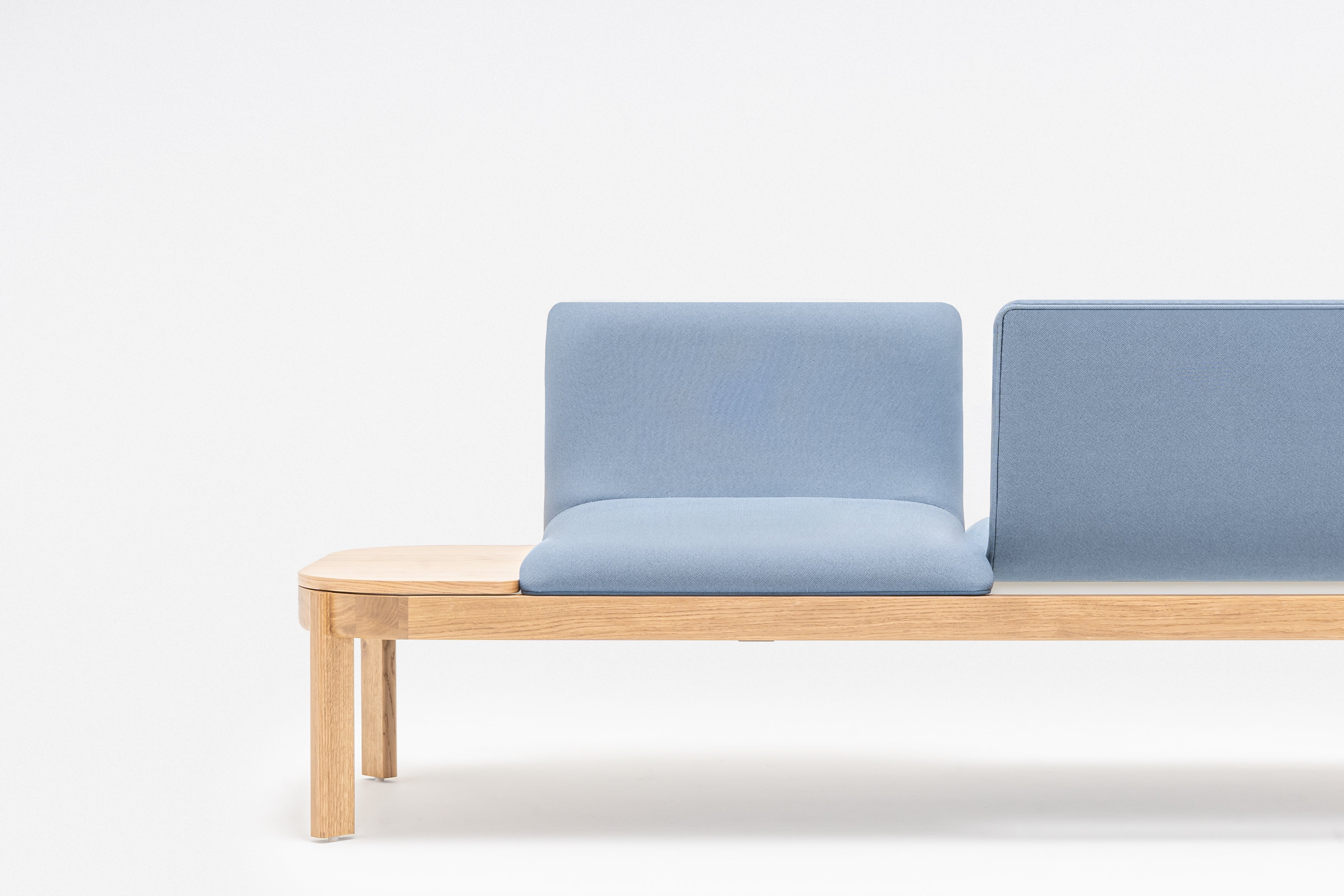 Upholstered bench with ramps of the wooden base