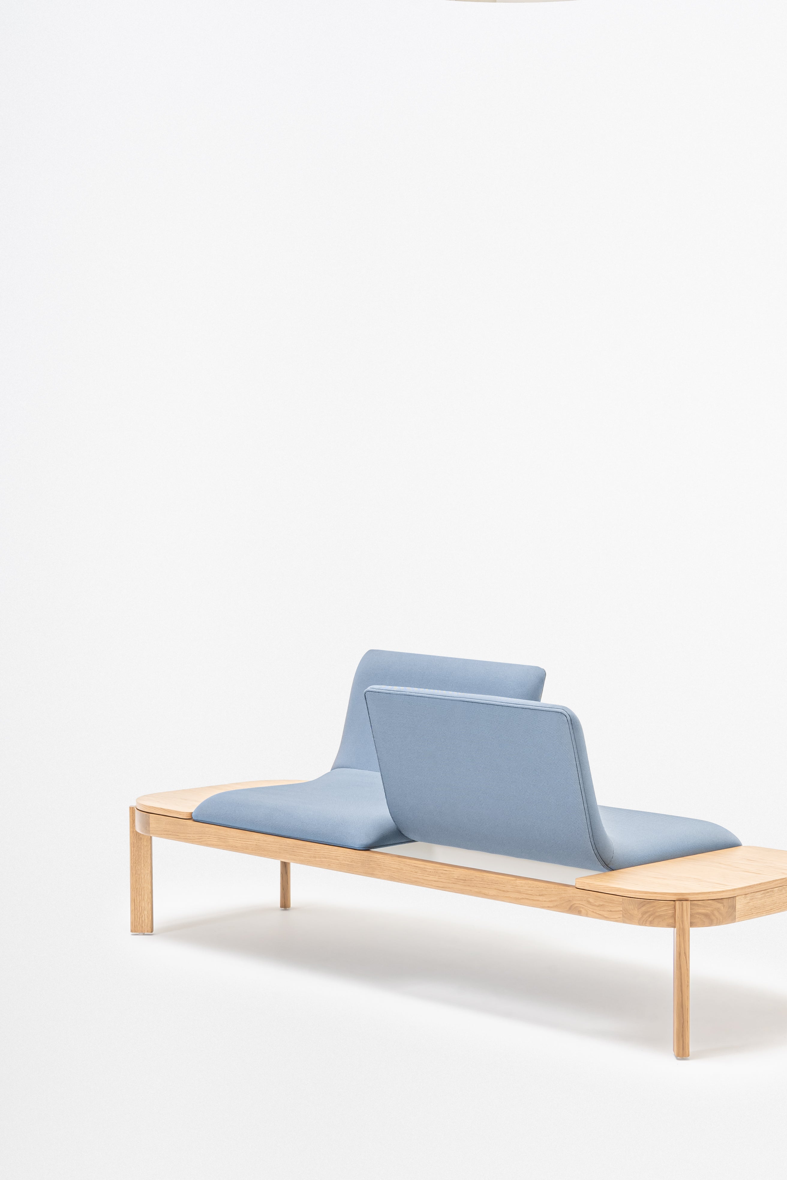 Upholstered bench with ramps of the wooden base