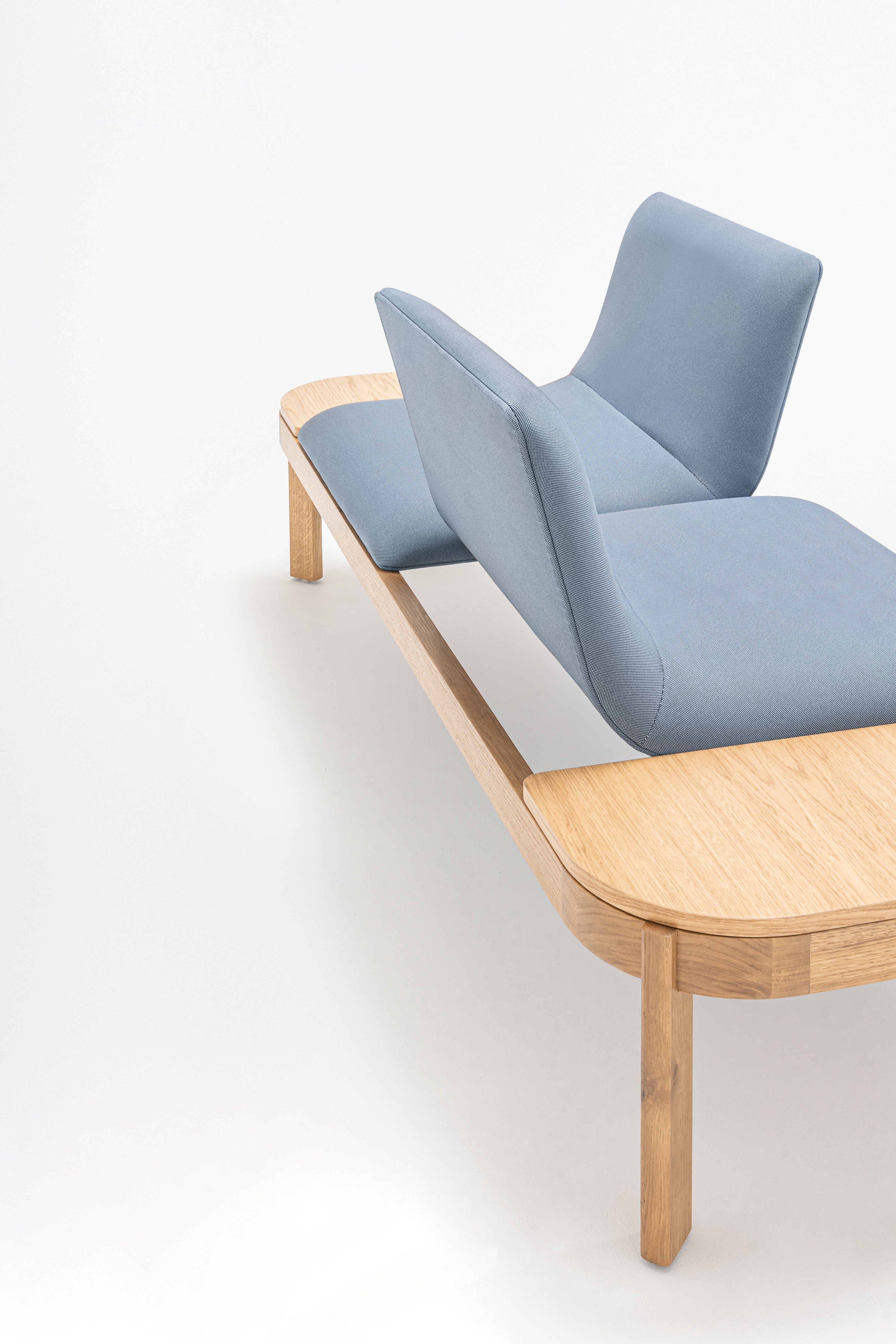 Upholstered bench with ramps of the wooden base