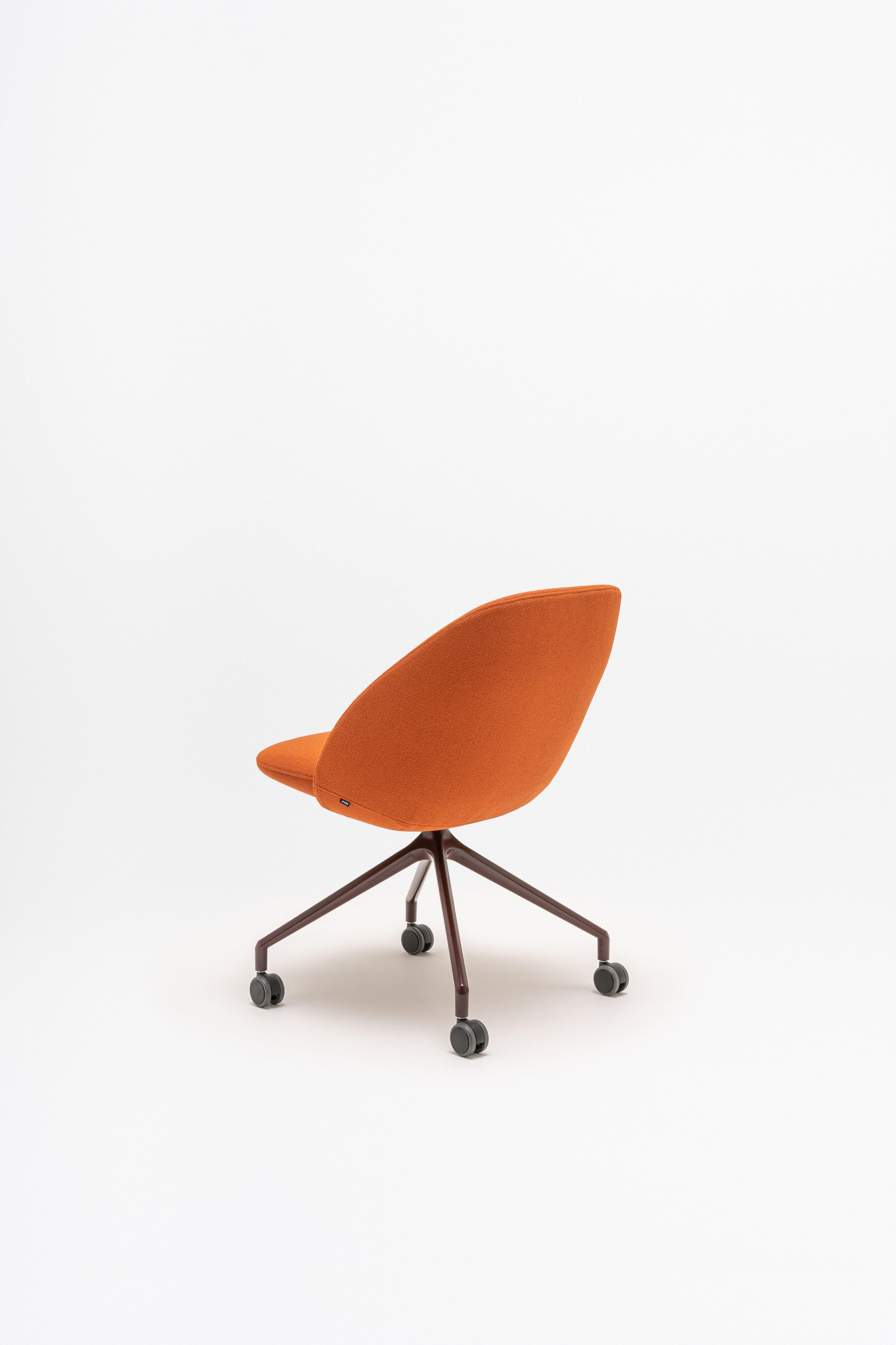 Swivel armchair with low back, a metal parallel base with wheels to a hard surface