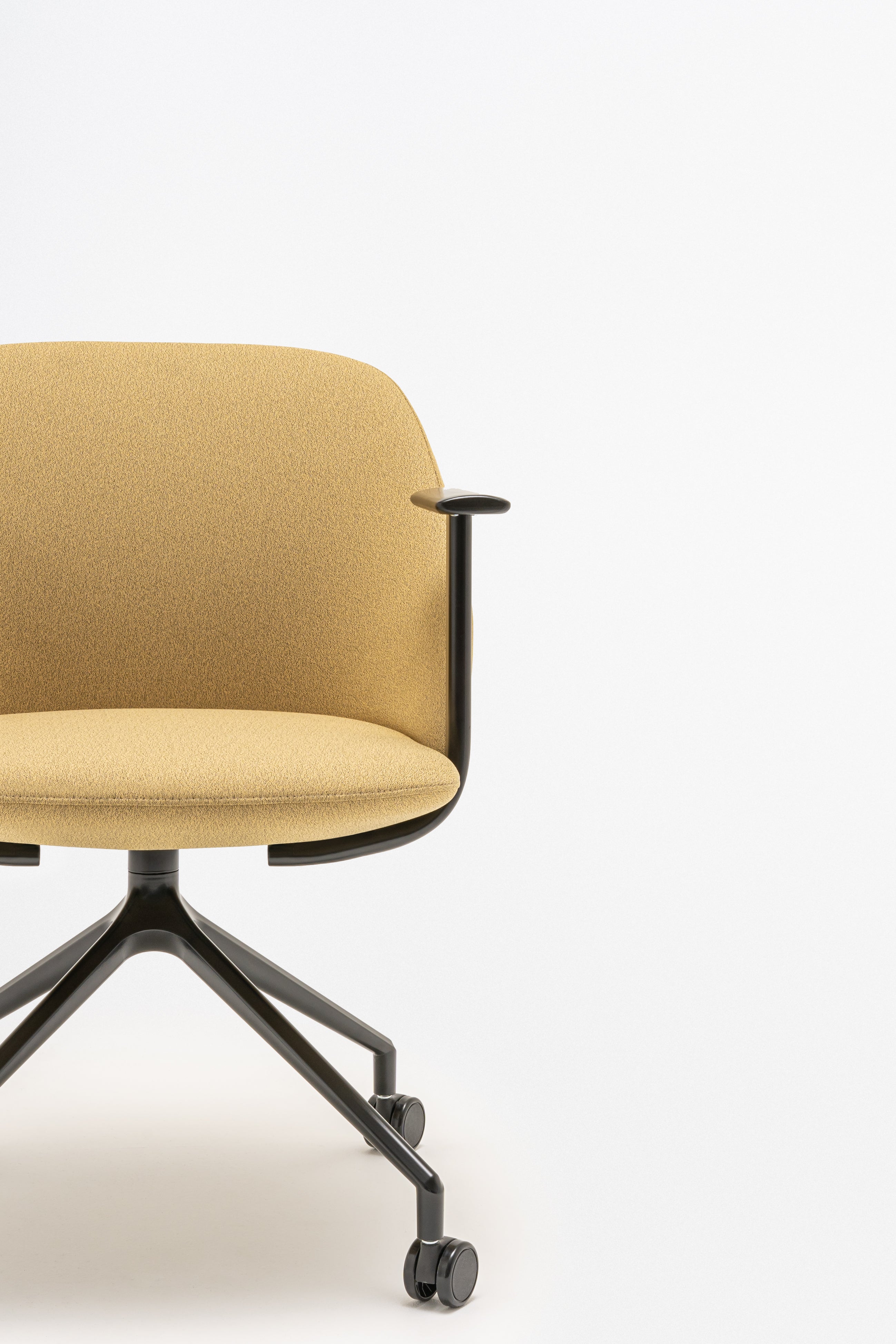 Swivel armchair with low back, a metal parallel base with wheels to a hard surface