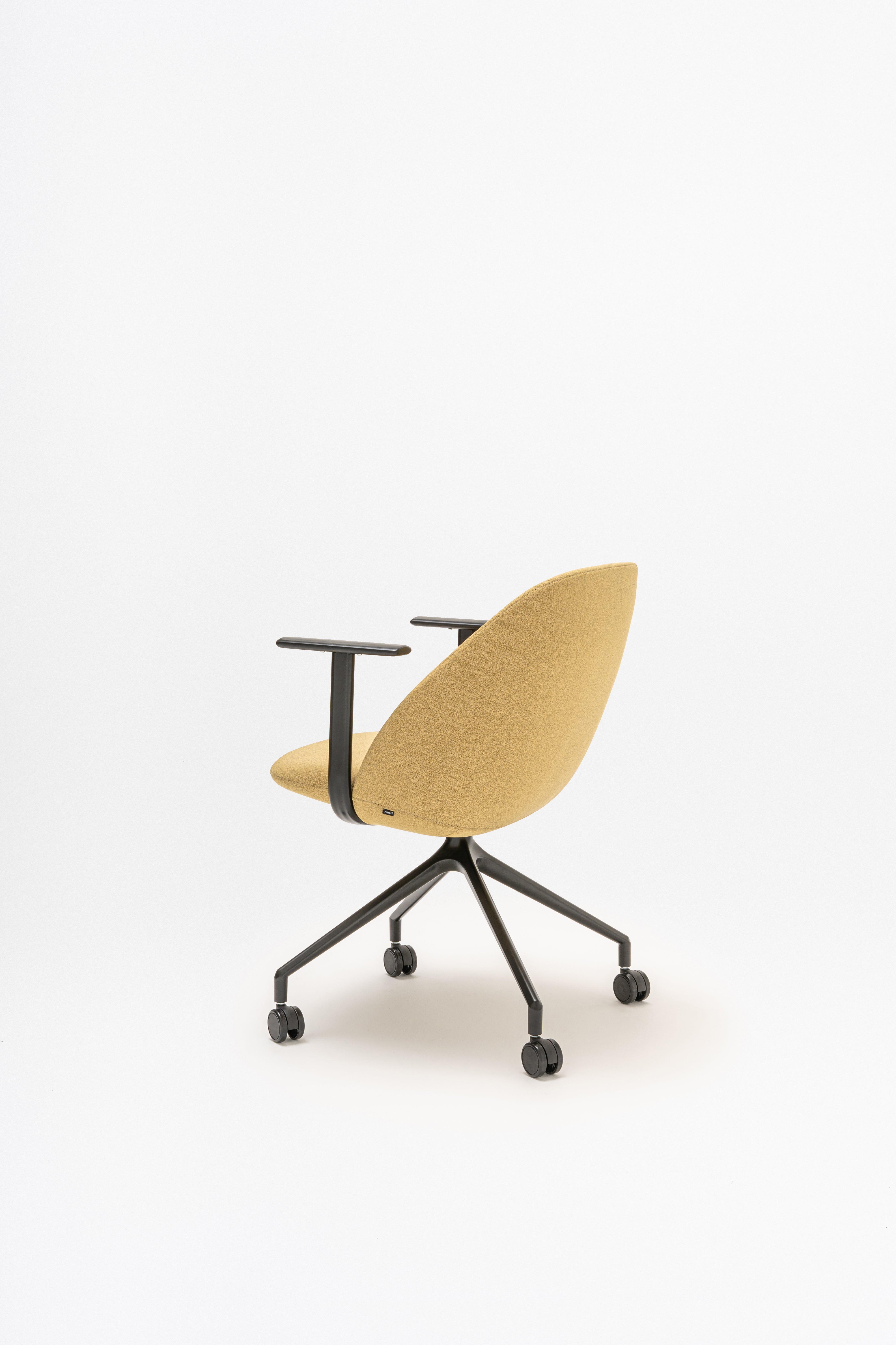 Swivel armchair with low back, a metal parallel base with wheels to a hard surface