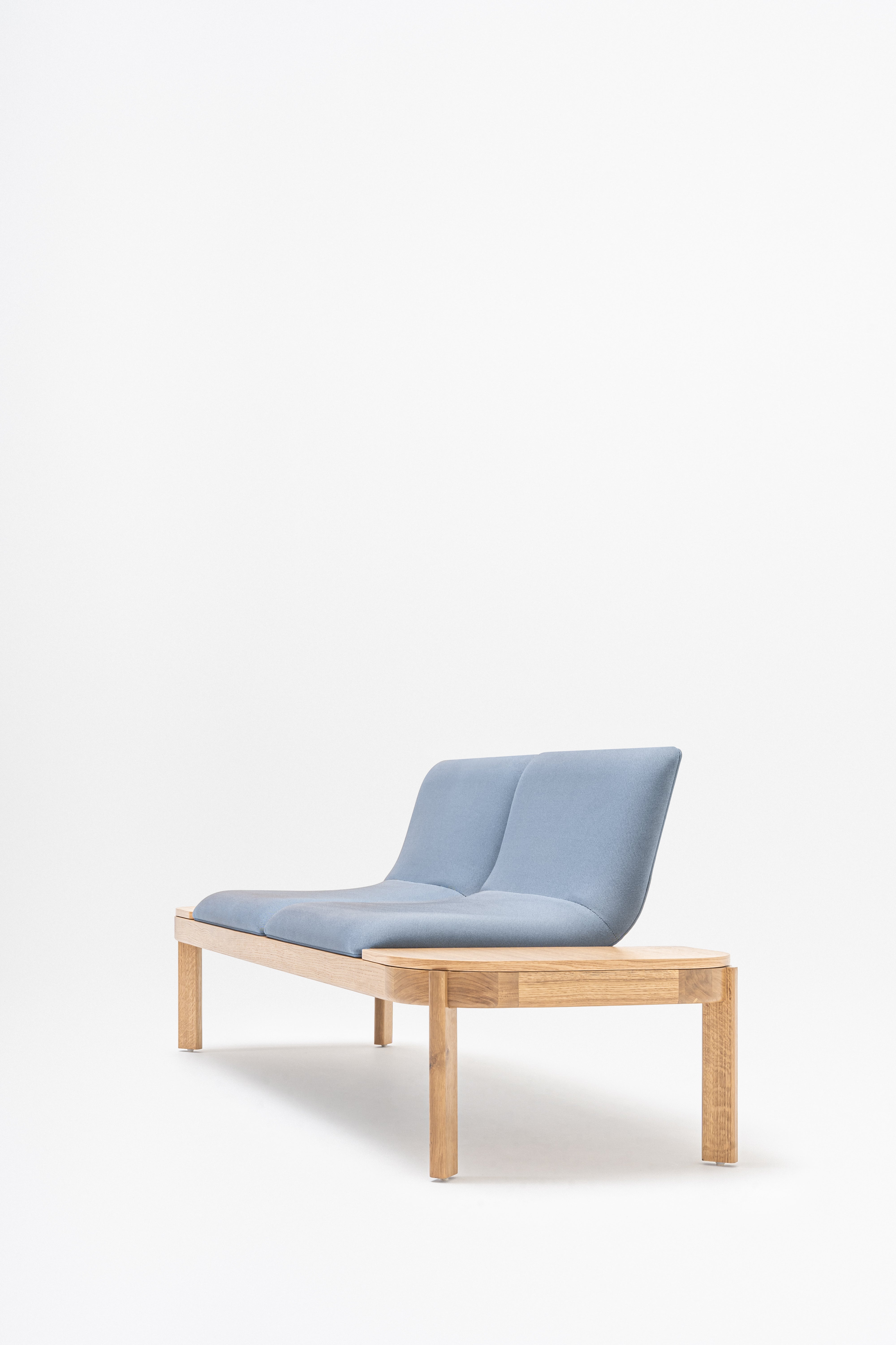 Upholstered bench with ramps of the wooden base