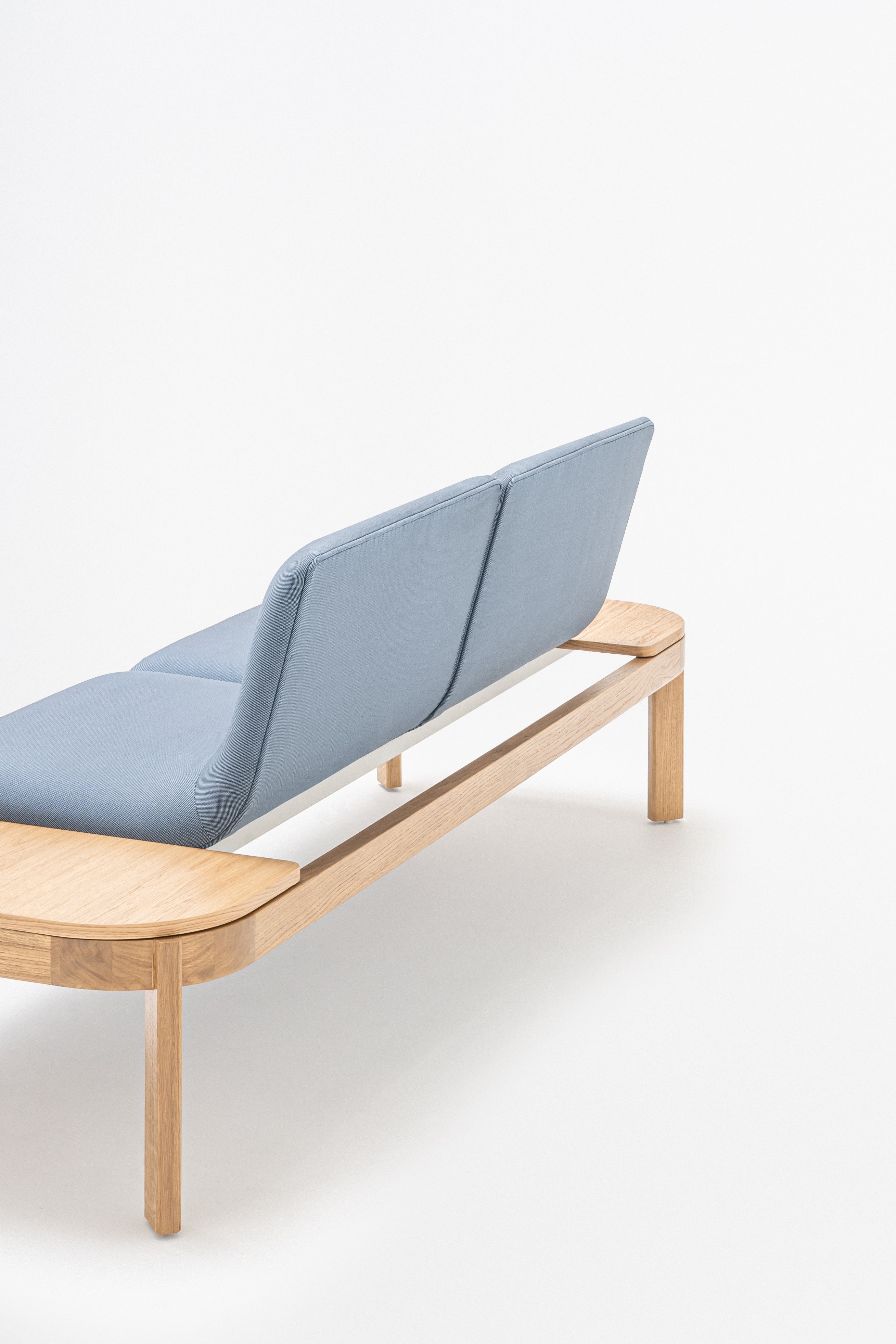 Upholstered bench with ramps of the wooden base