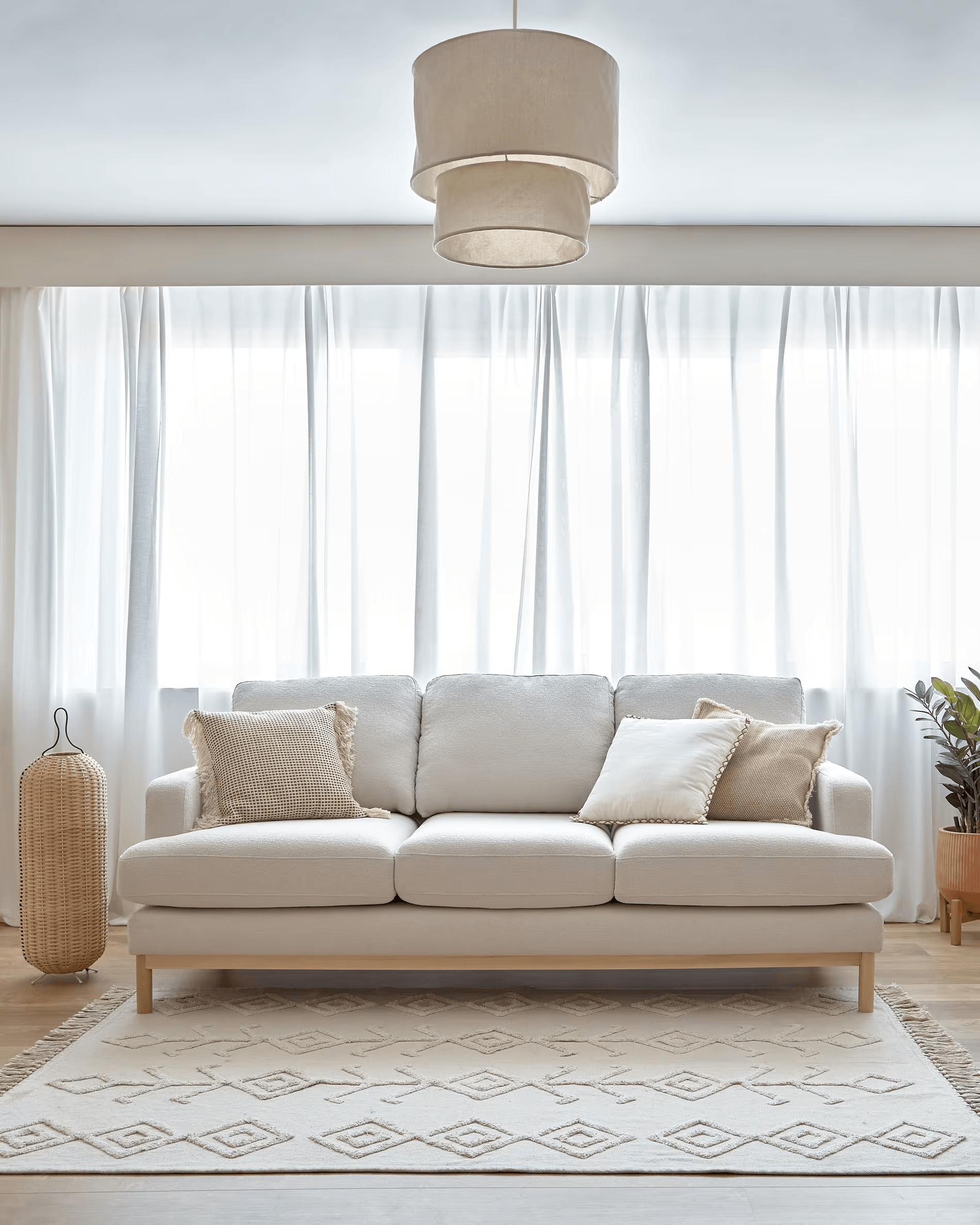 Sofa MIHAELA kremowy boucle La Forma Eye on Design