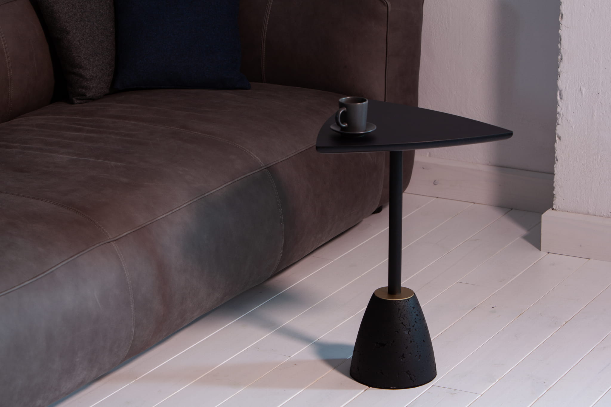 CONCRI HPL black coffee table with a concrete base