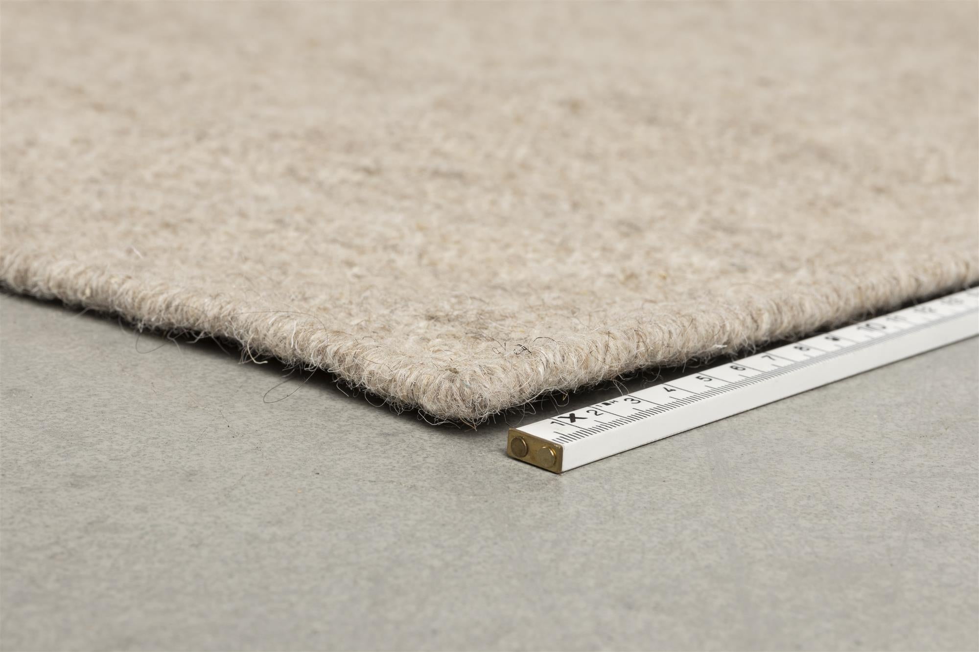 Brite beige Teppich