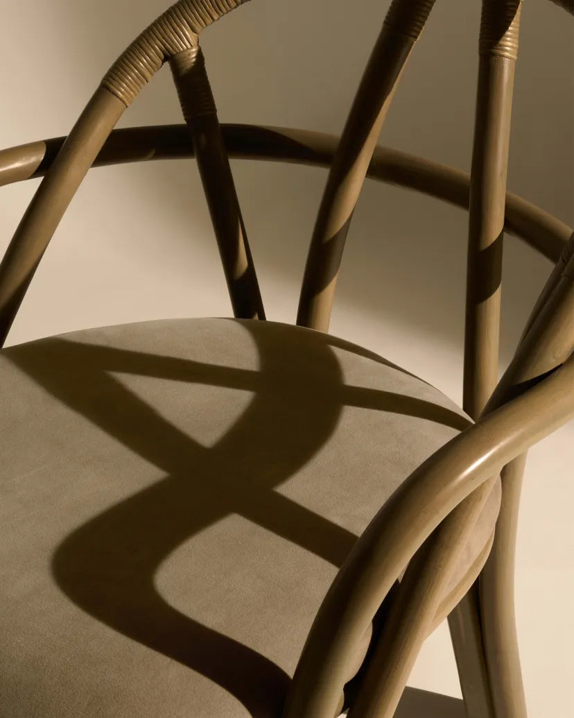 BISTRA upholstered chair with an olive rattan base