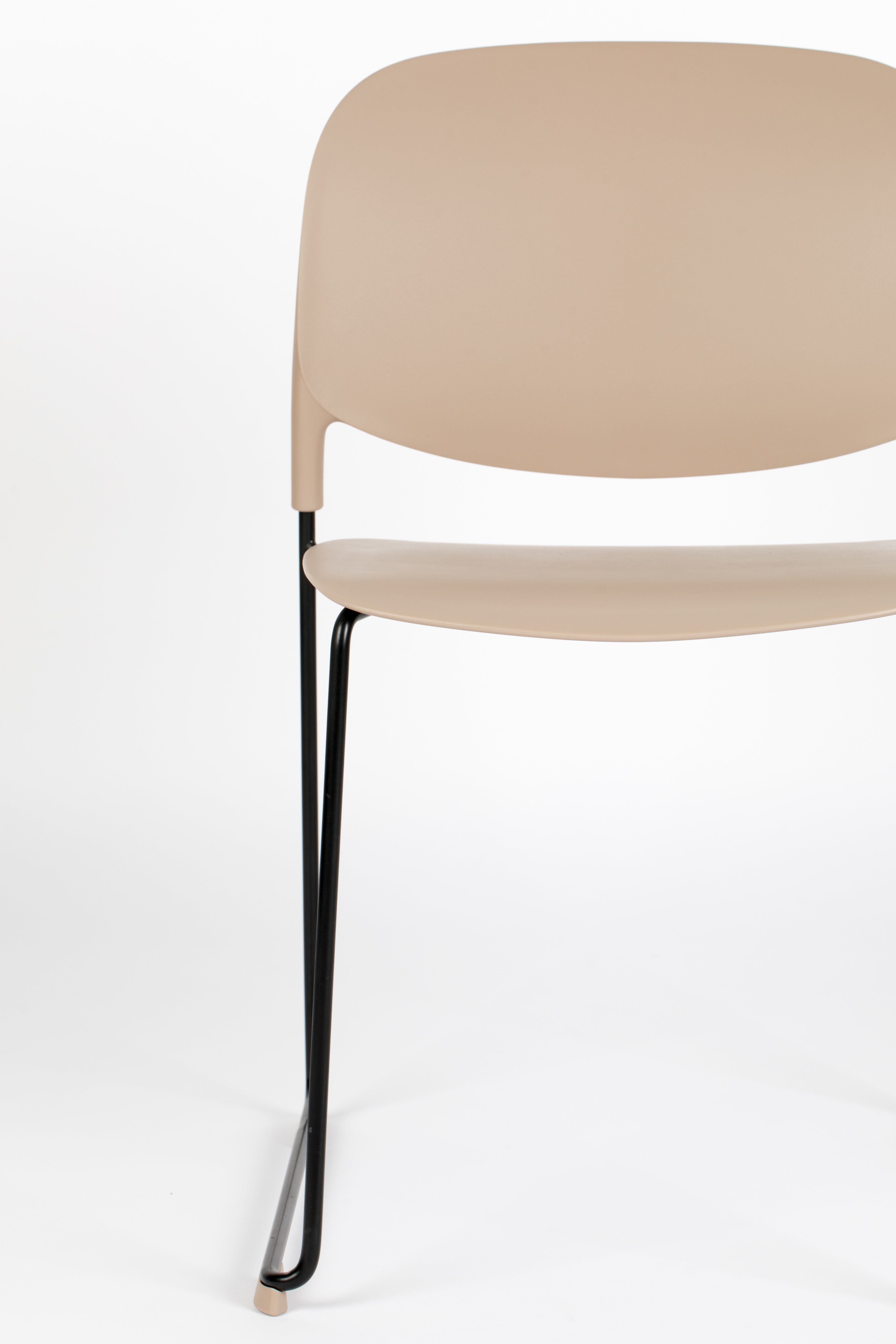 Stacks beige chair with a black base