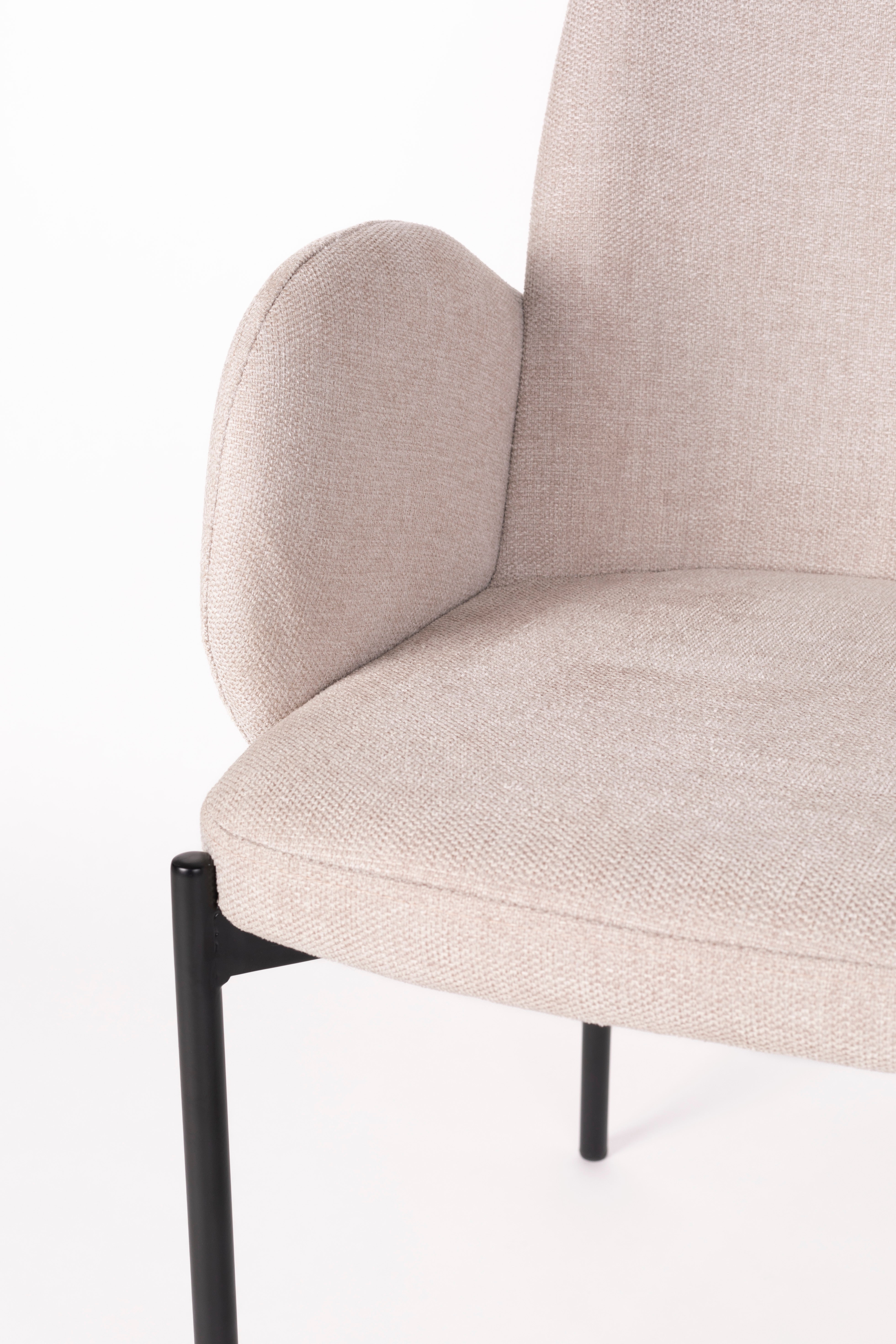 Chair with armrests, i.e. a creamy