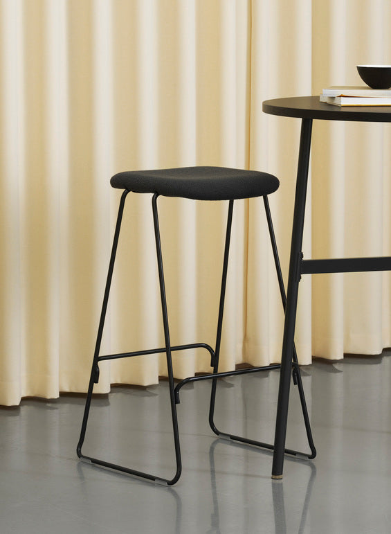 Bar chair upholstered just with a black base