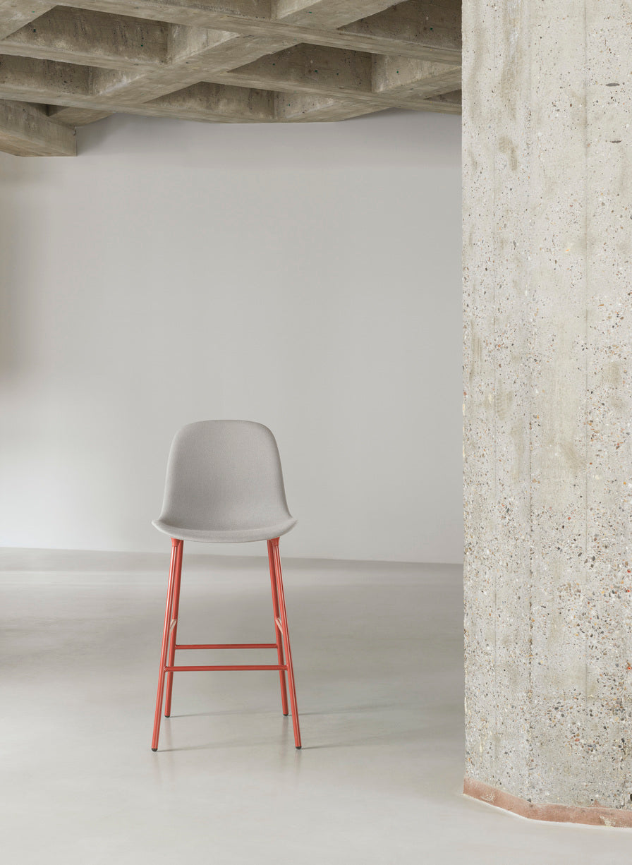 Bar chair upholstered forms with a gray base
