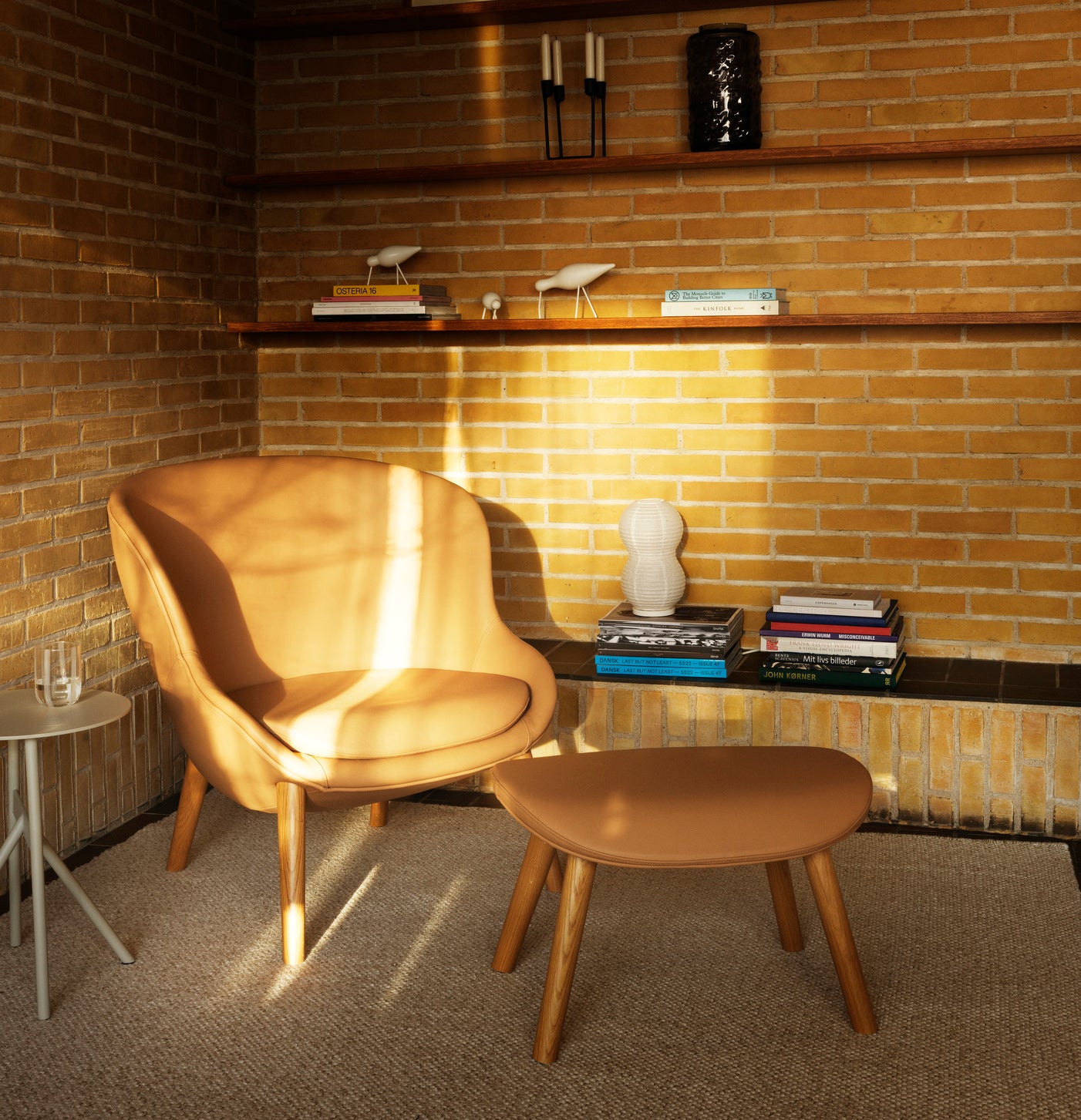 Hyg Upholstered footrest with a black oak base