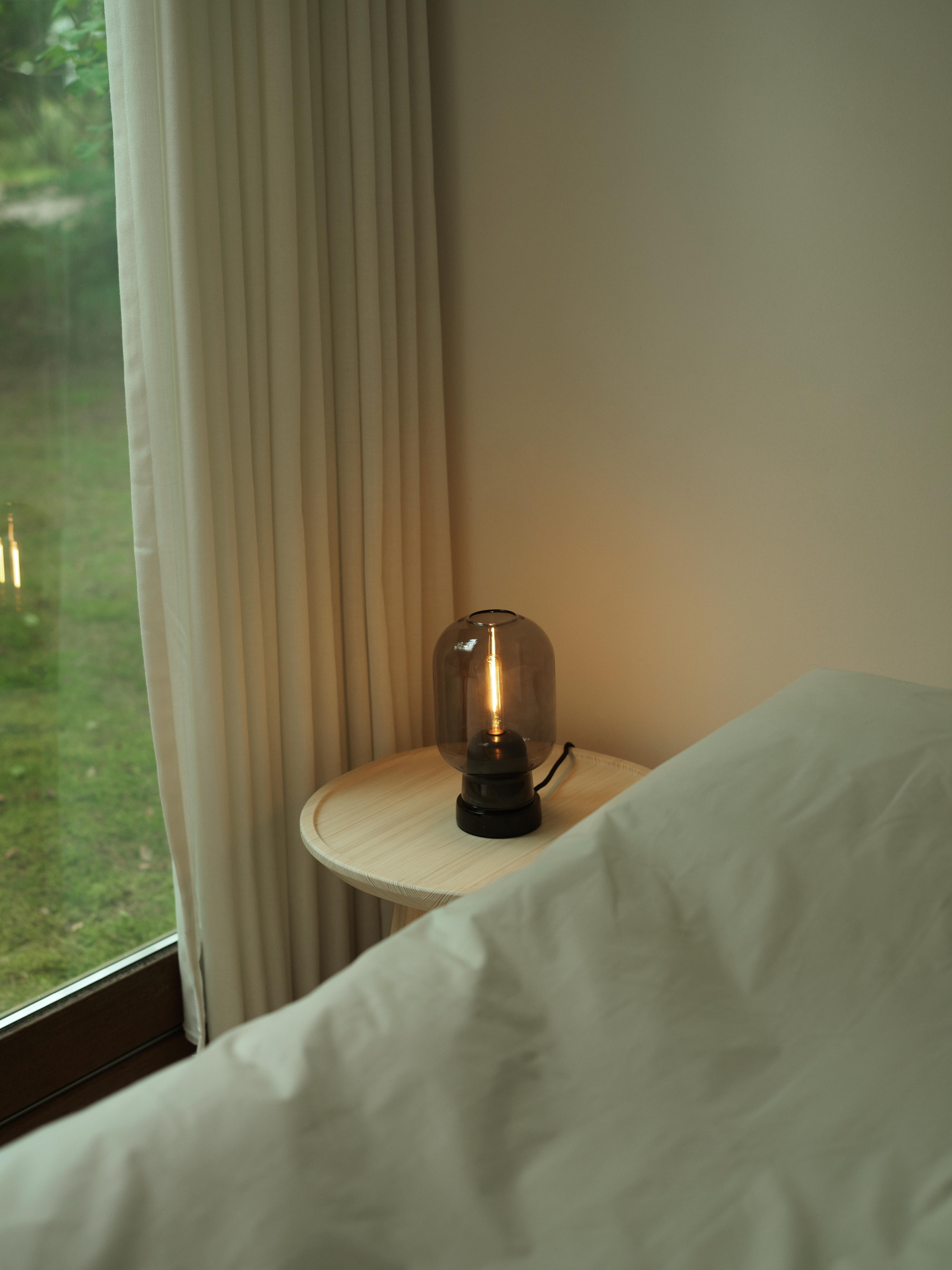 AMP table lamp in smoked glass with black marble