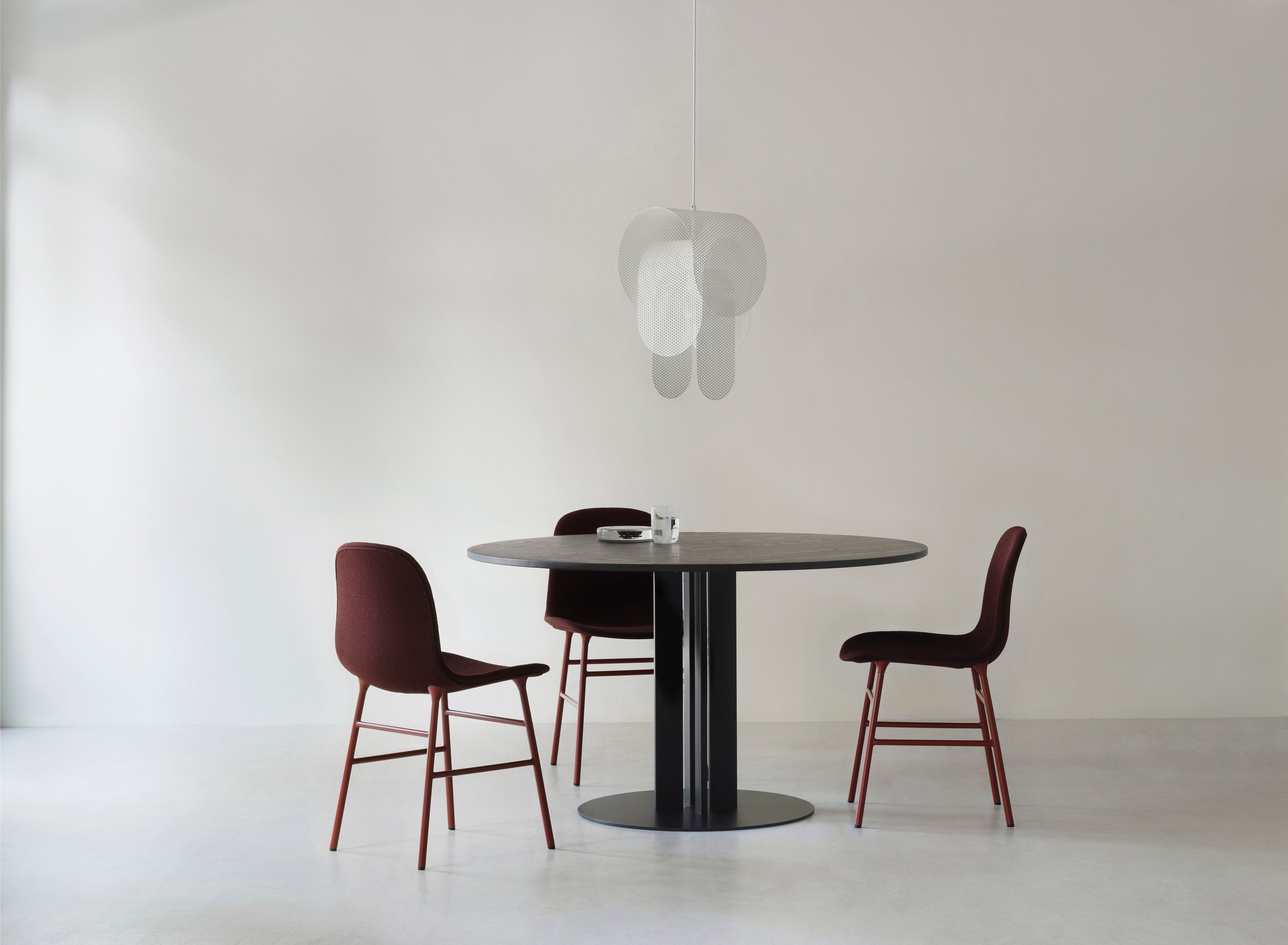 Upholstered chair forms with a light gray base