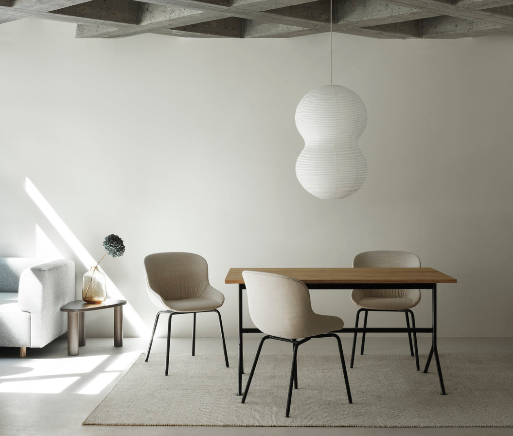 Hyg chair upholstered with a black base
