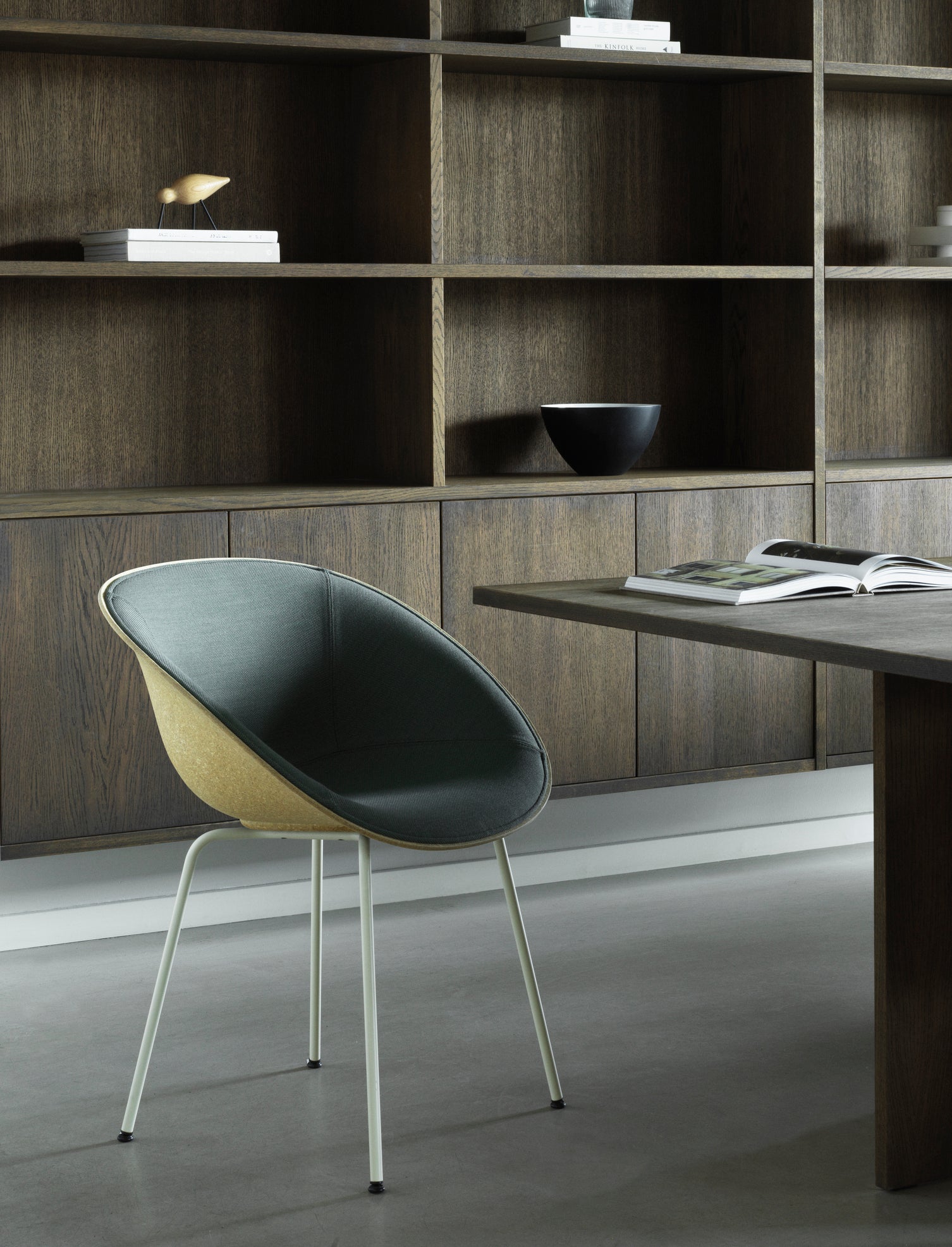 A chair upholstered mats with a cream base